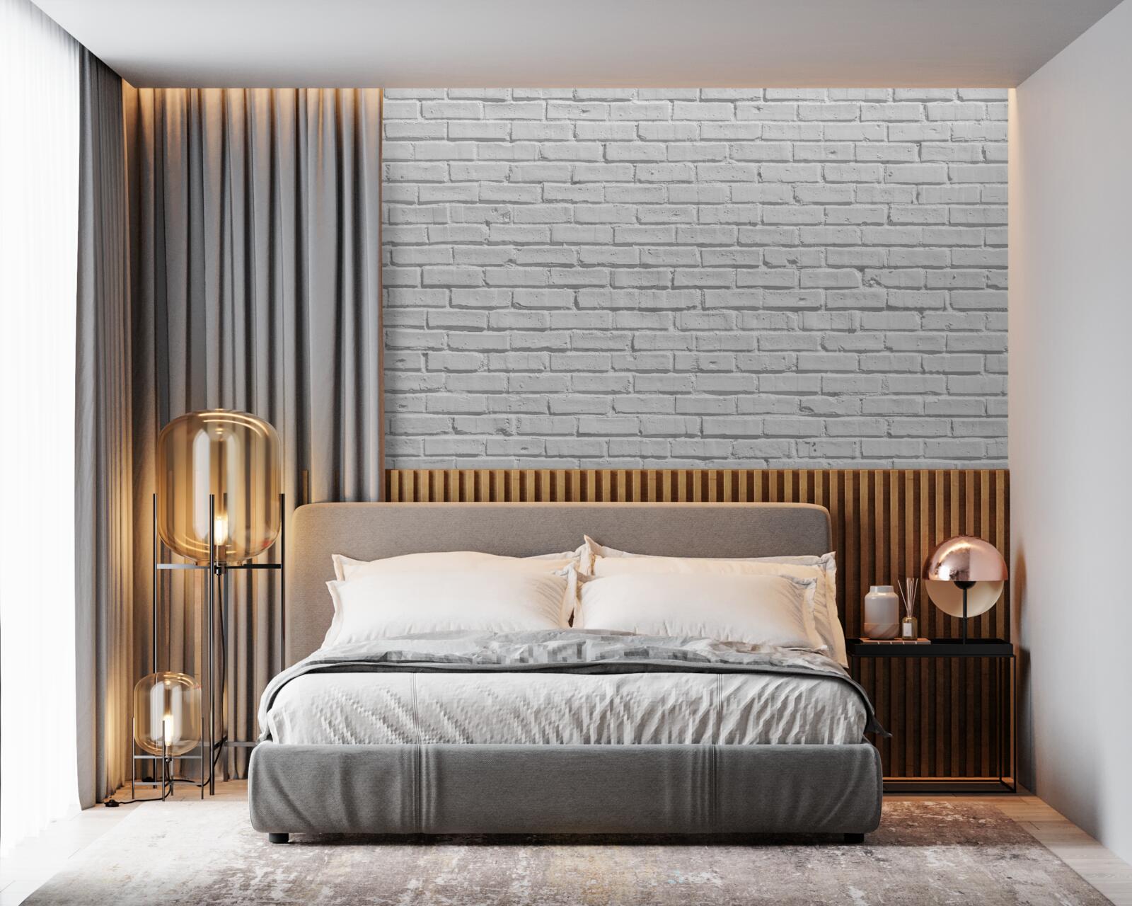 Papier peint Le mur de briques est peint en blanc