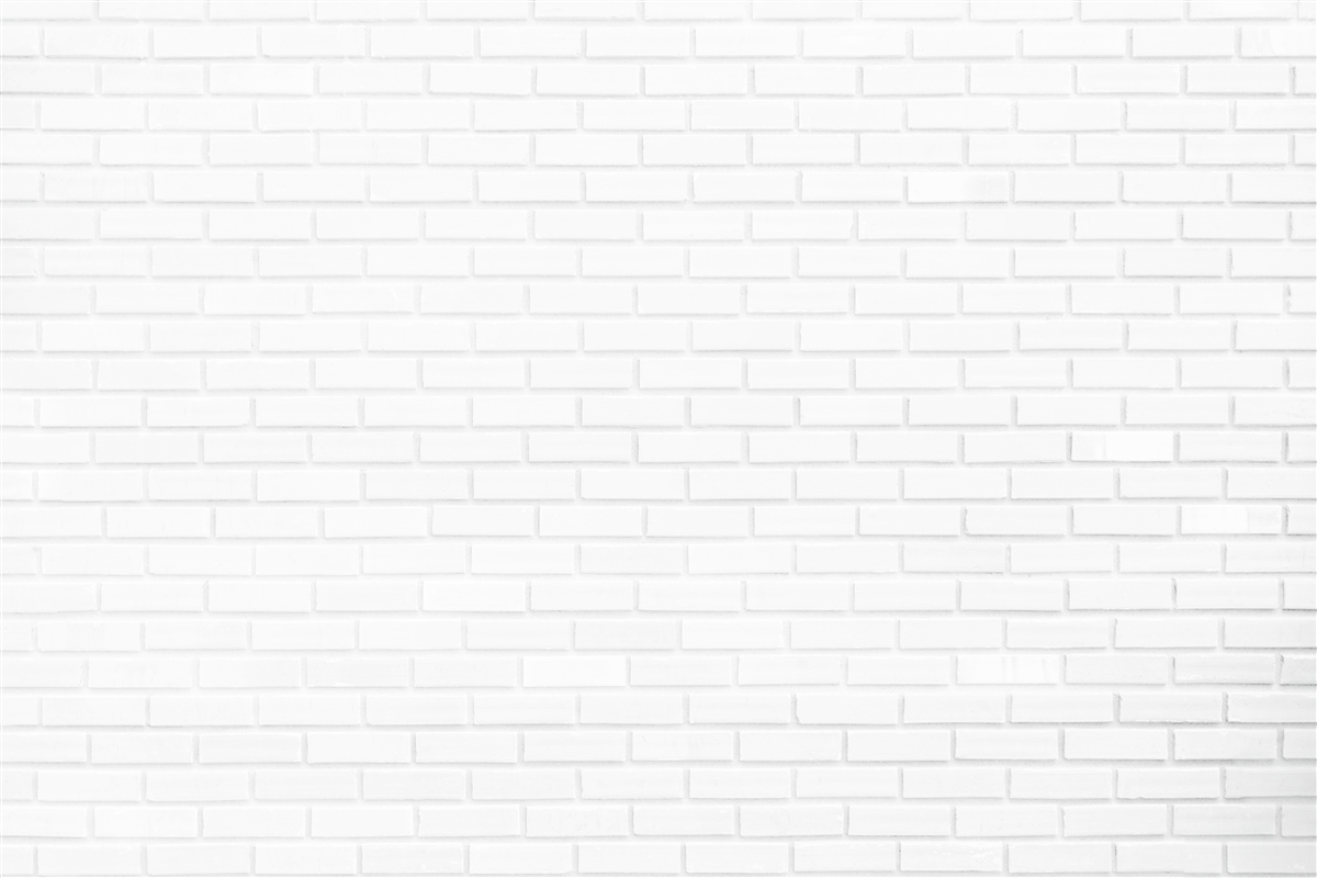 Papier peint le mur de briques est d'un blanc immaculé