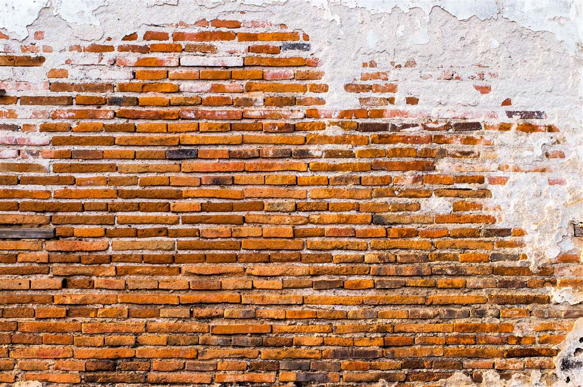 Papier peint vieux mur de briques qui a perdu son aspect