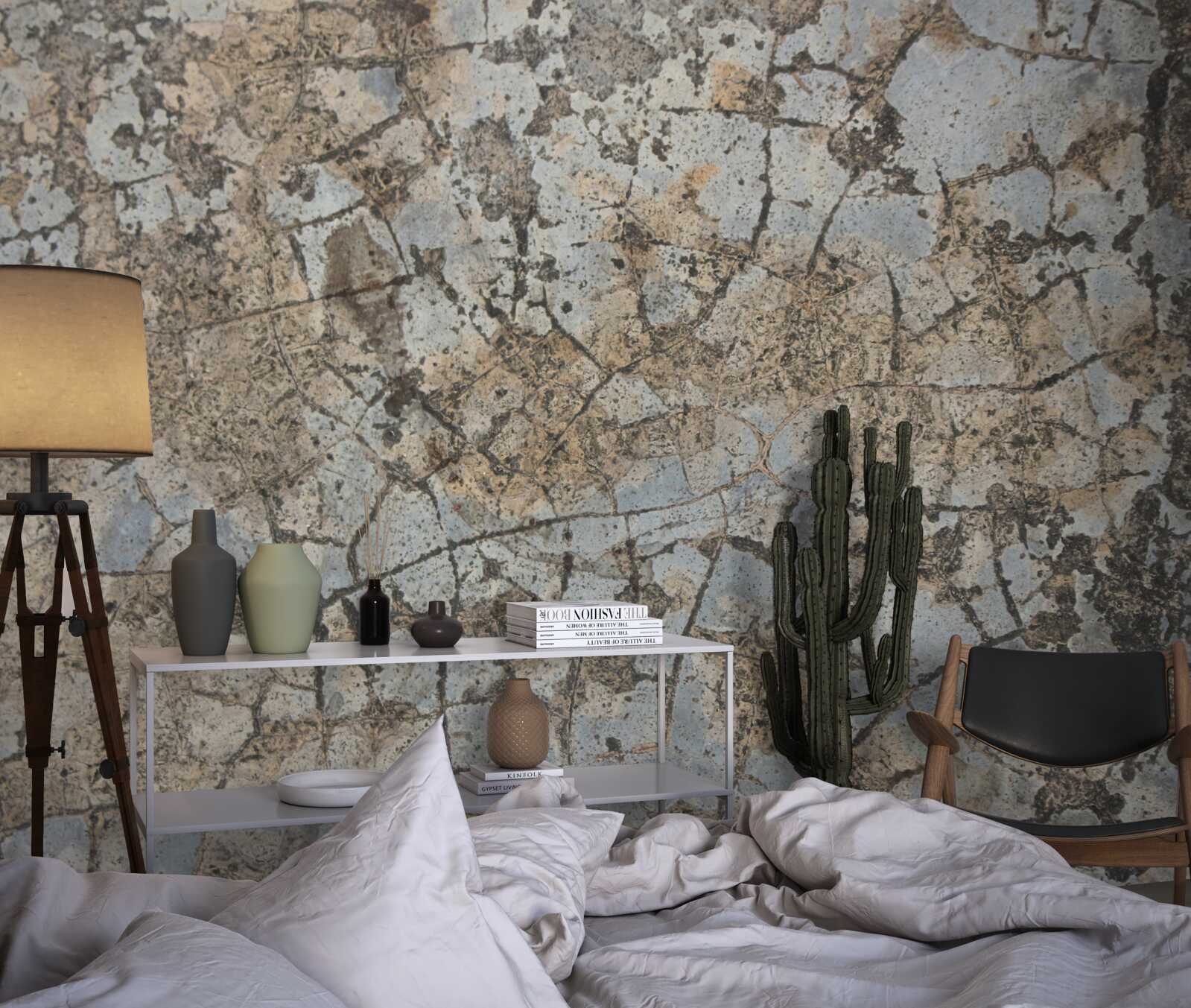 Papier peint surface en marbre, parsemée de fissures