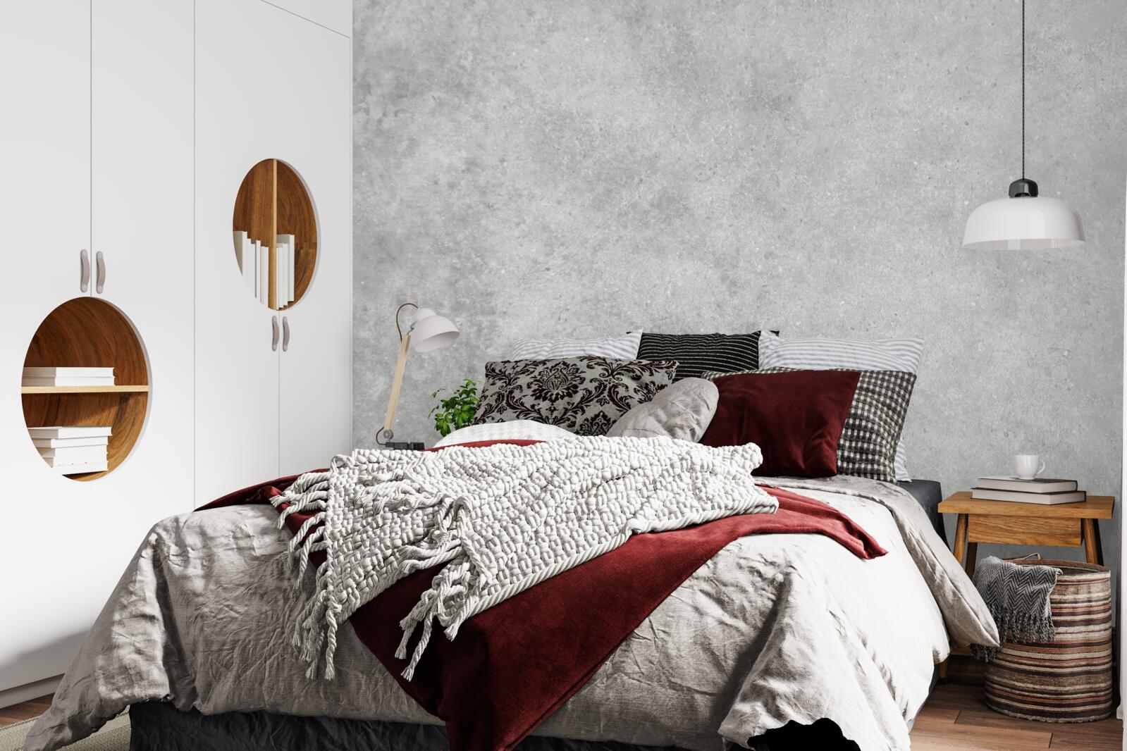 Papier peint Le mur est en béton de couleur gris clair.