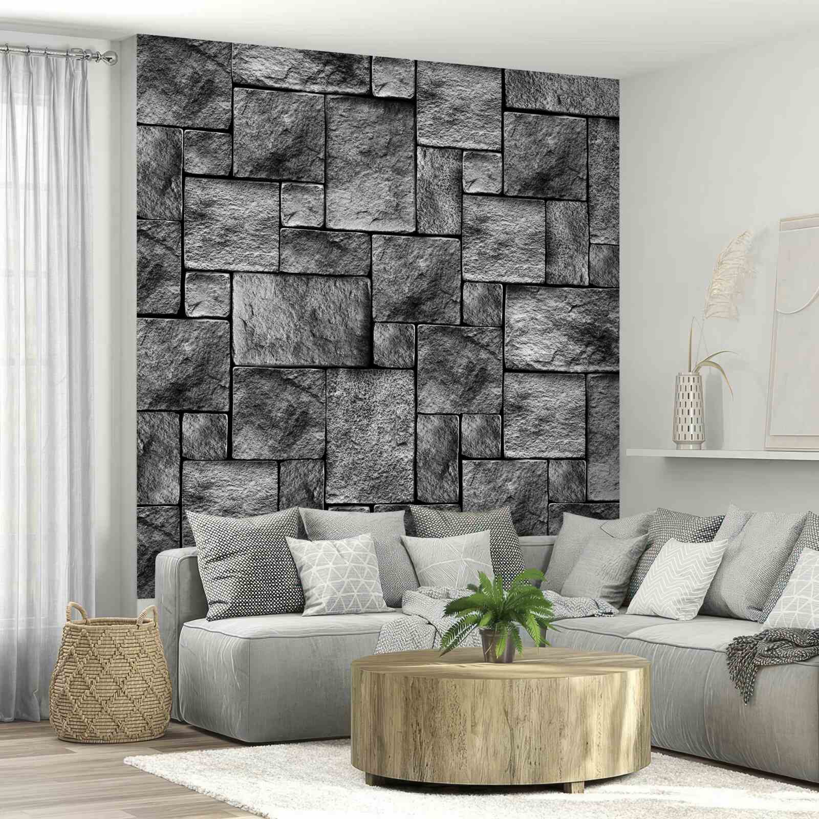 Papier peint pierre grise en tant que partie d'un mur