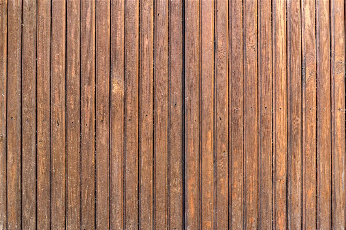 Papier peint barrière continue faite de vieilles poutres en bois