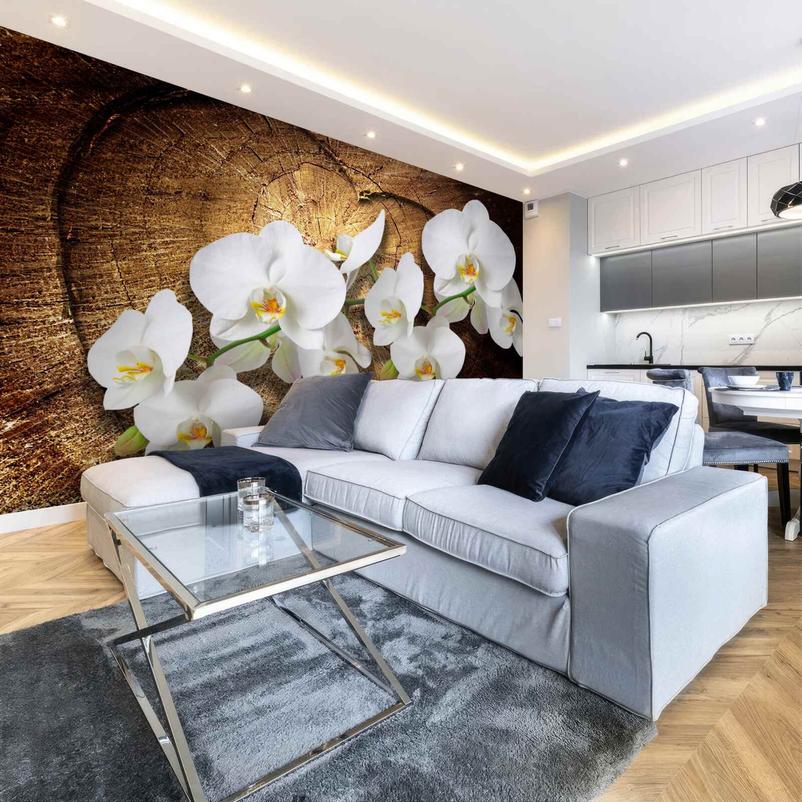 Papier peint Orchidée blanche sur un tronc d'arbre coupé