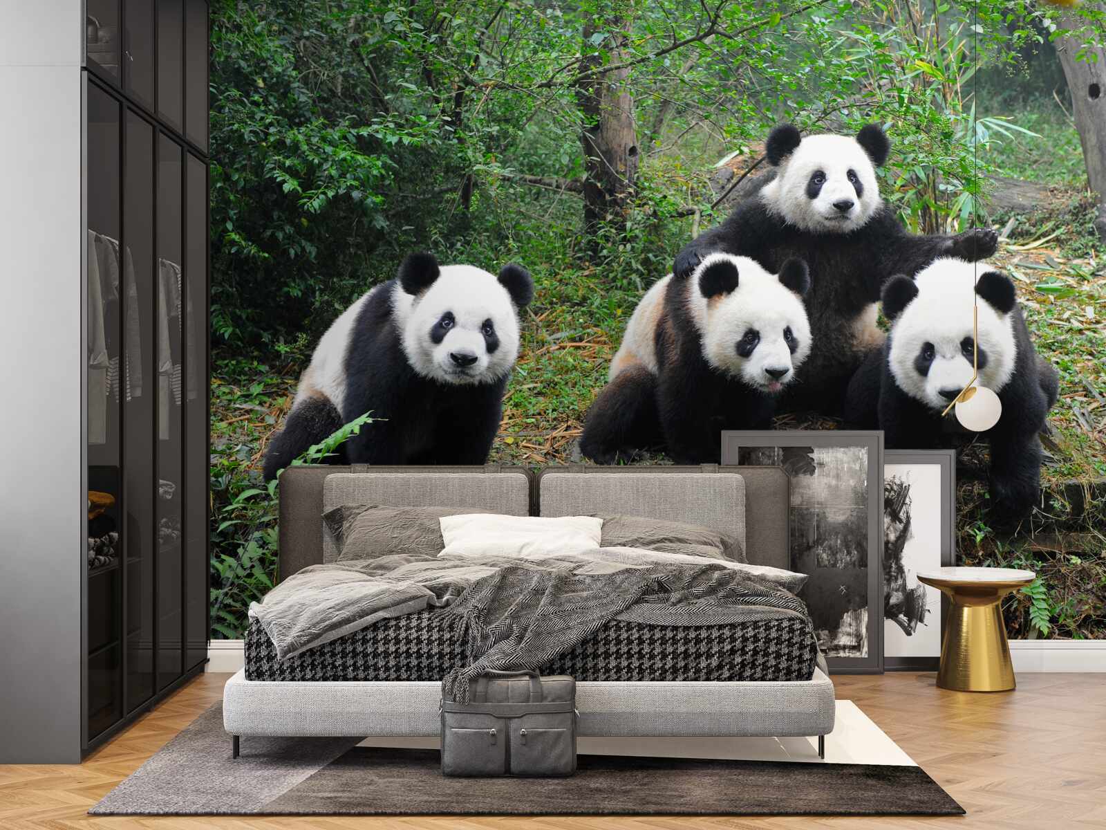 Papier peint une famille d'adorables pandas au repos
