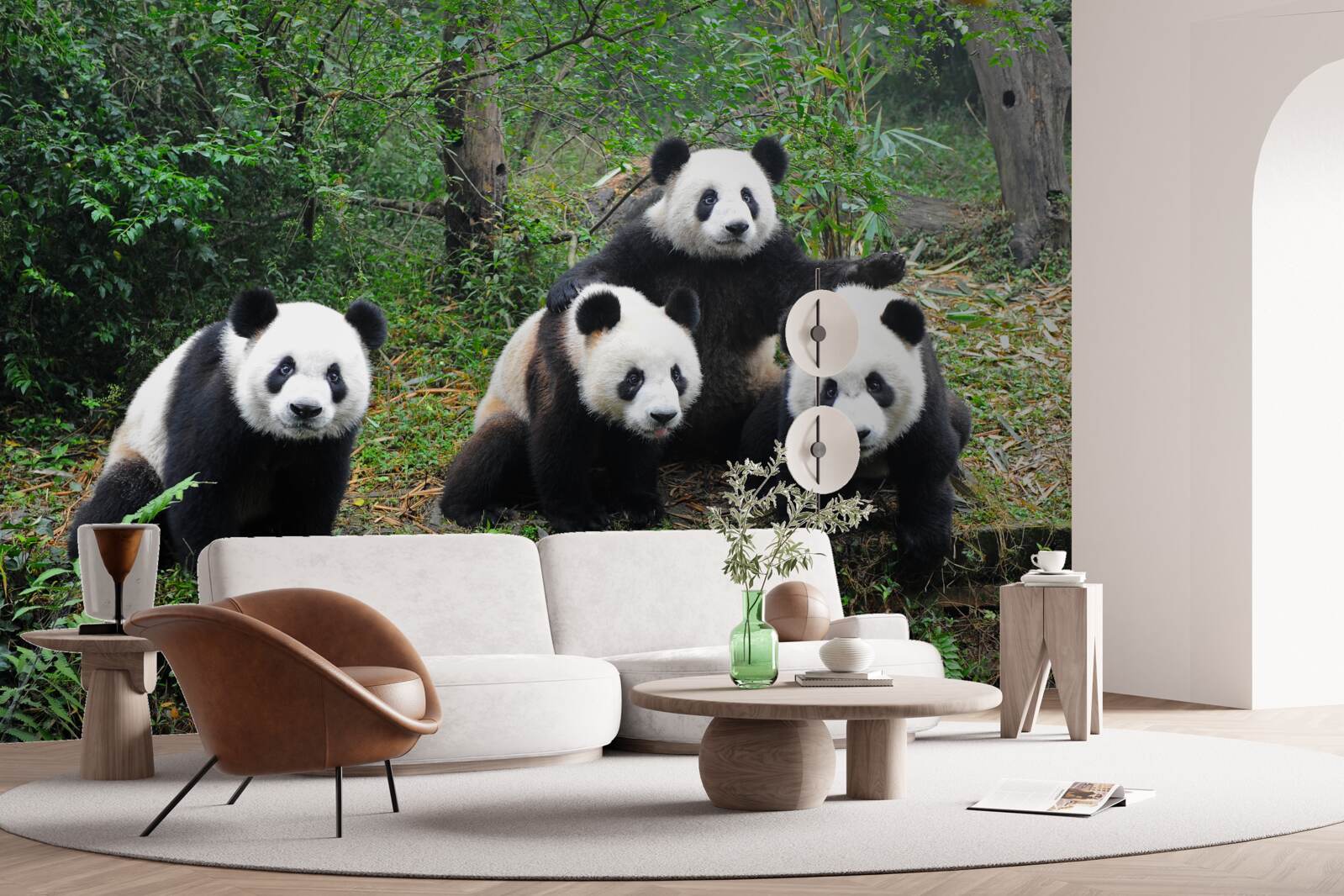 Papier peint une famille d'adorables pandas au repos