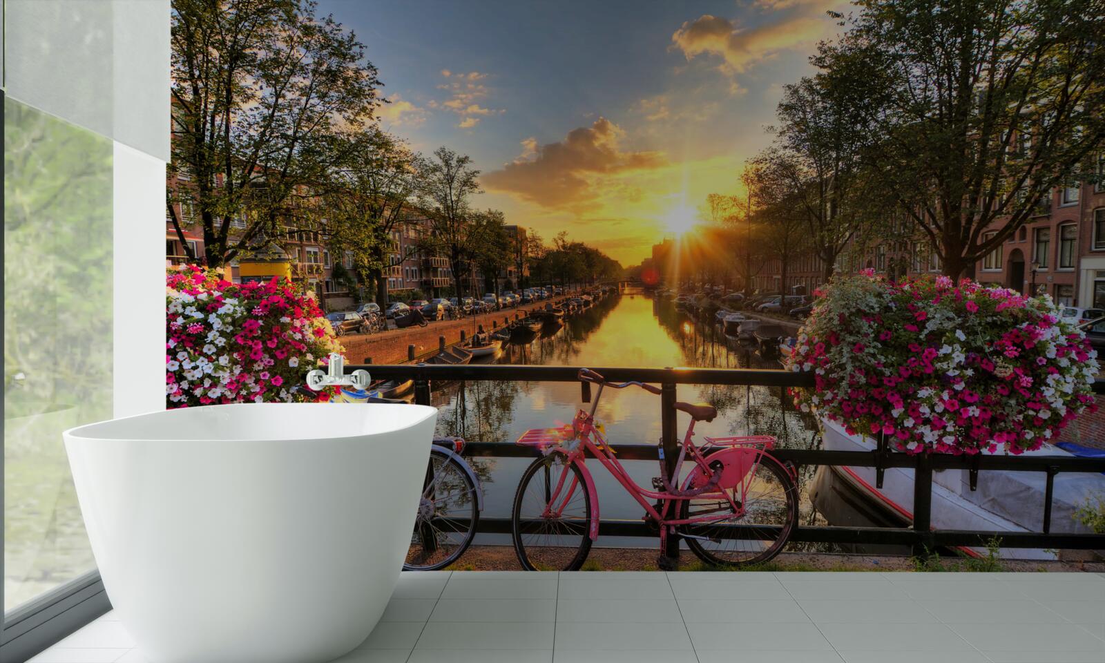 Papier peint coucher de soleil à amsterdam avec des vélos en arrière-plan