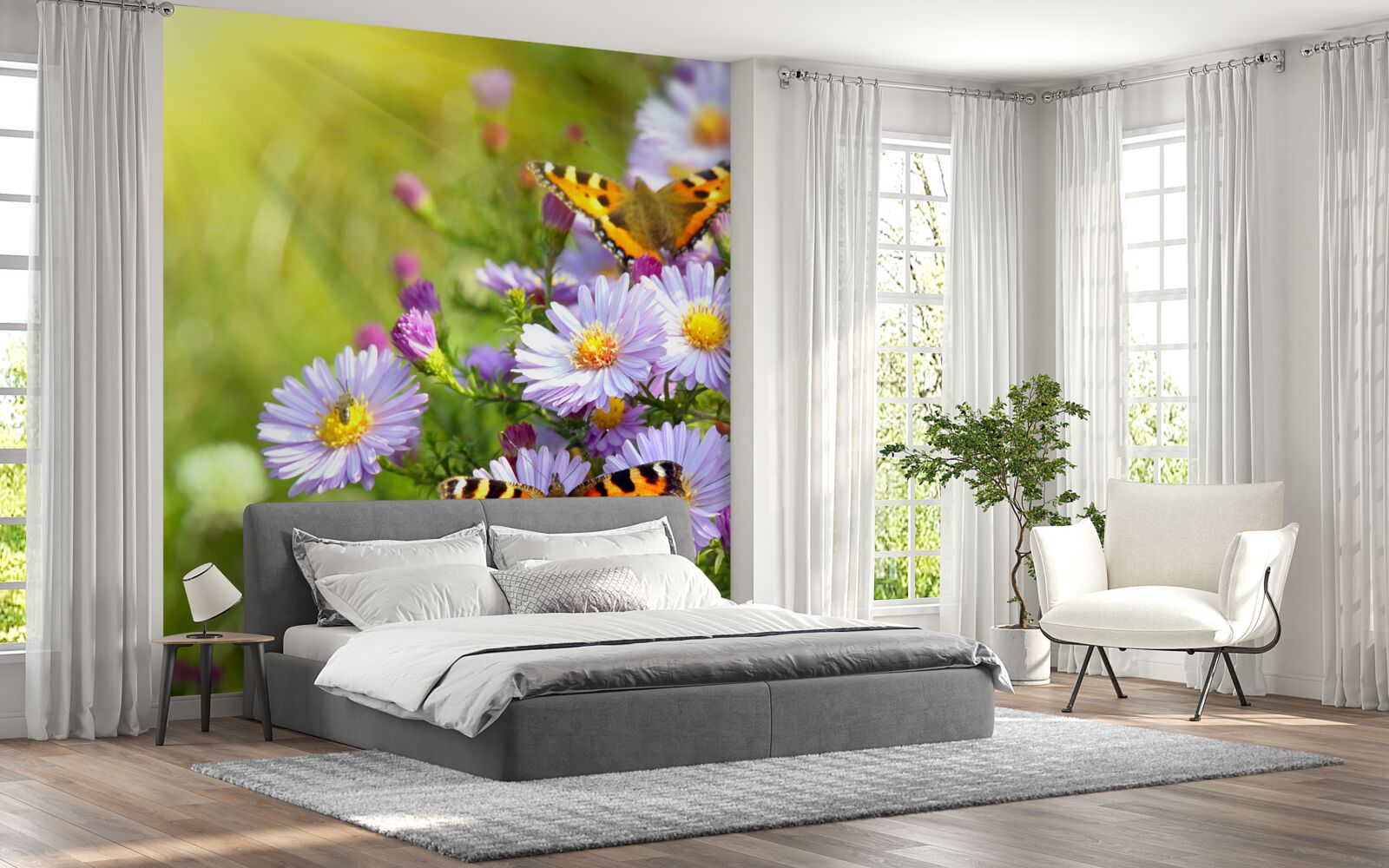 Papier peint Une prairie parsemée de marguerites bleues et de papillons