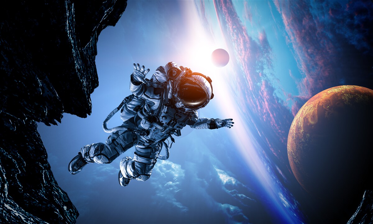 Papier peint astronaute dans l'univers