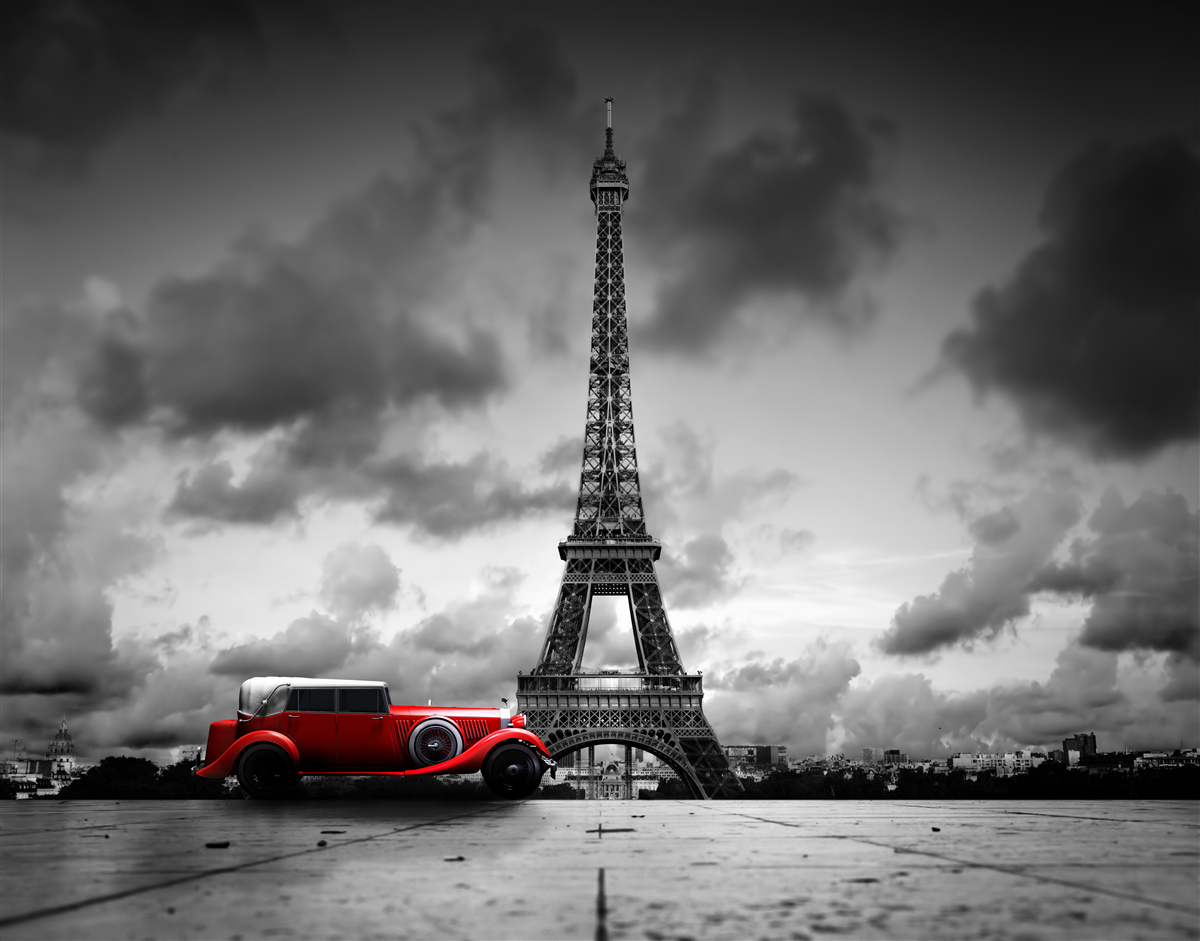 Papier peint voiture rouge à côté de la tour eiffel