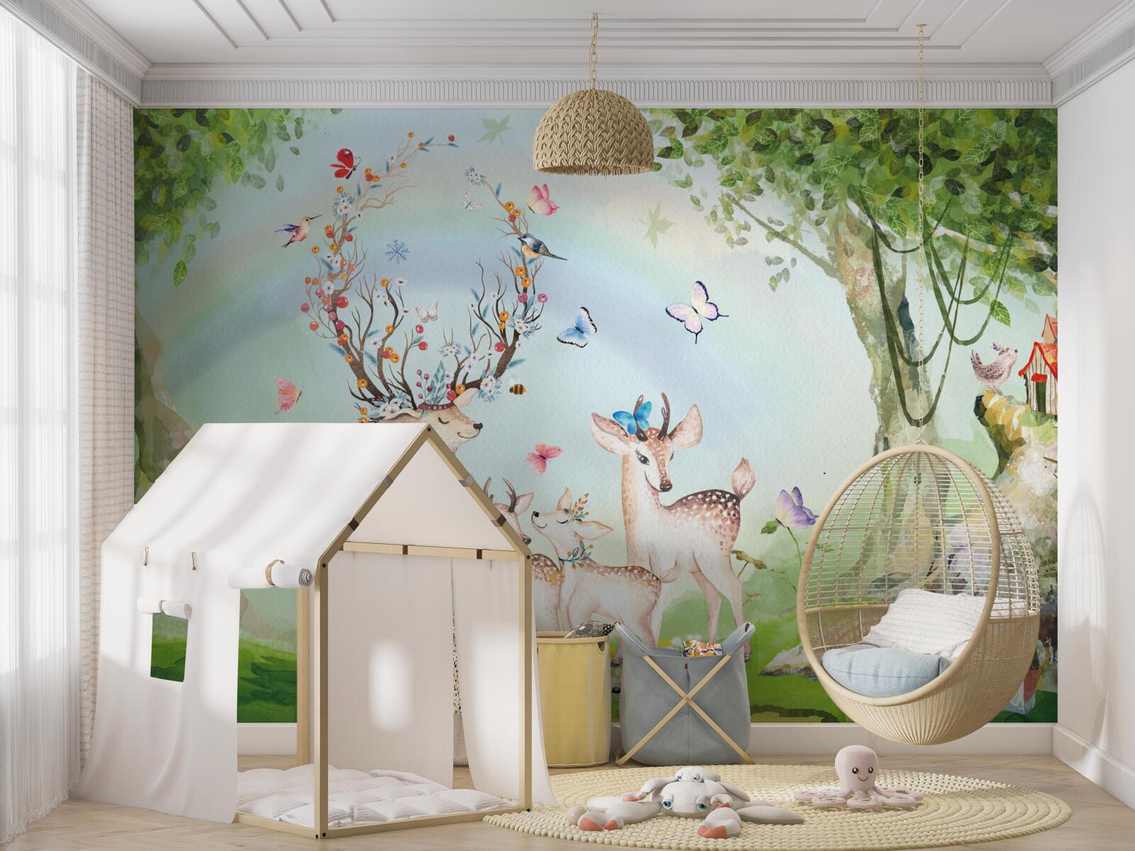 Papier peint une famille de cerfs dans une forêt magique