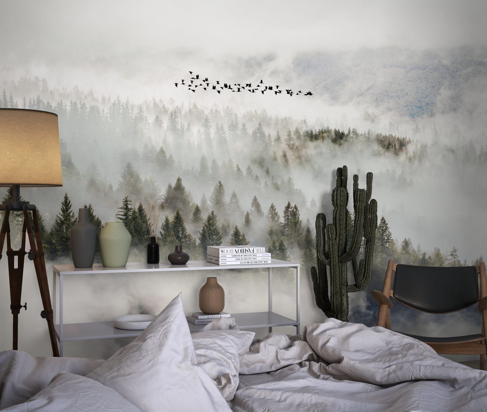 Papier peint un groupe d'oiseaux au-dessus d'un maquis montagneux nuageux
