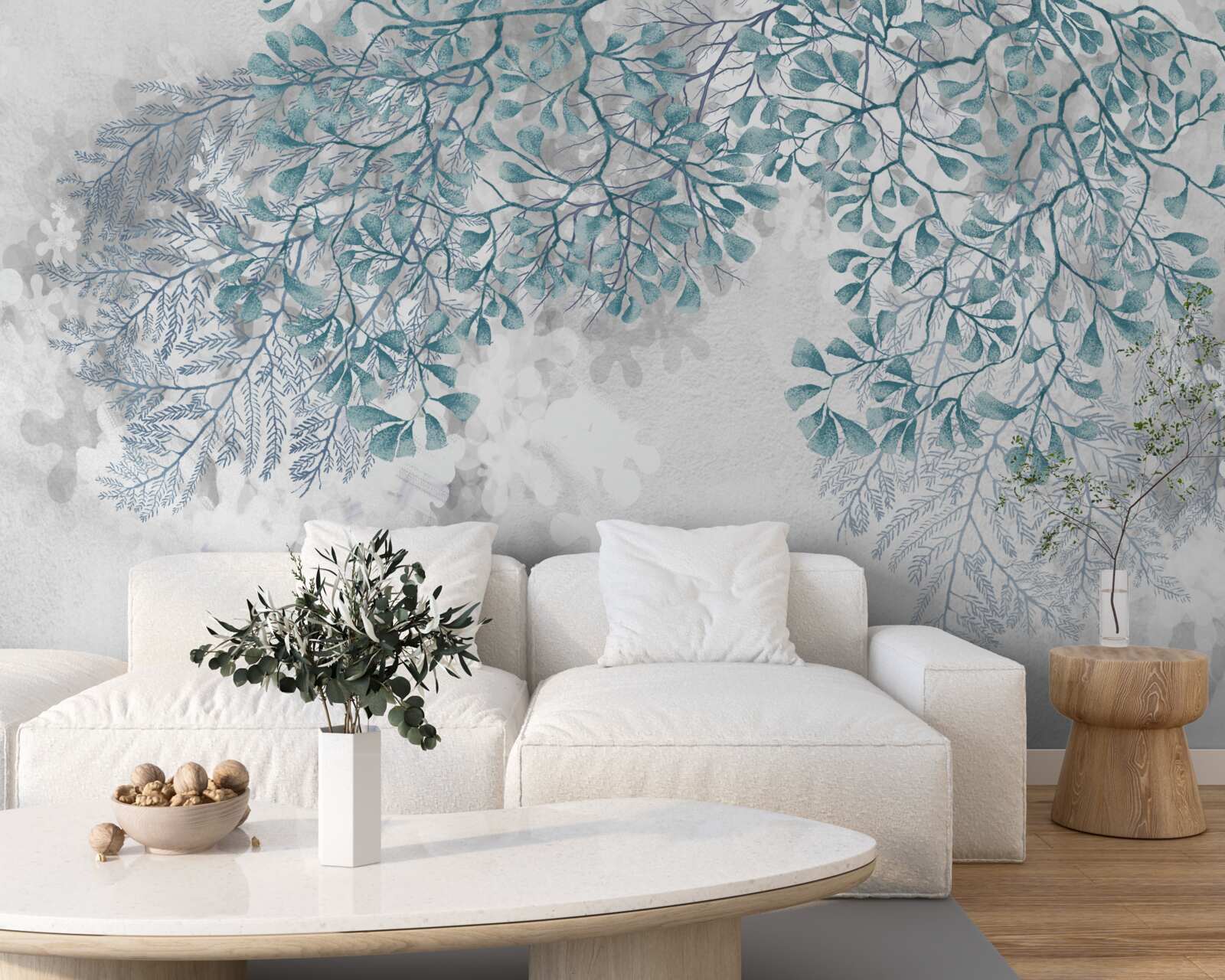 Papier peint les branches avec des feuilles turquoises sont visibles sur un fond clair