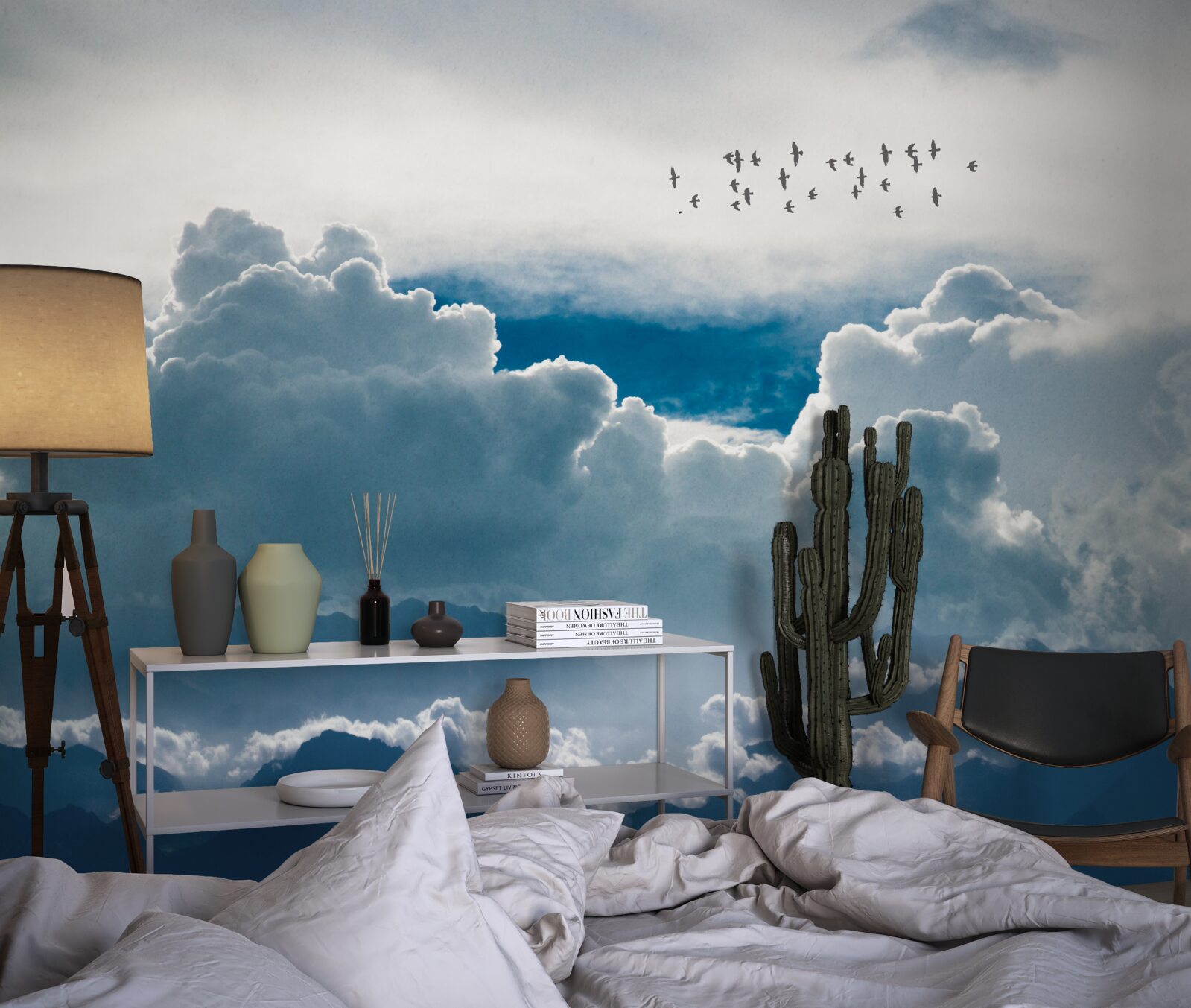 Papier peint groupe d'oiseaux au-dessus de nuages épais