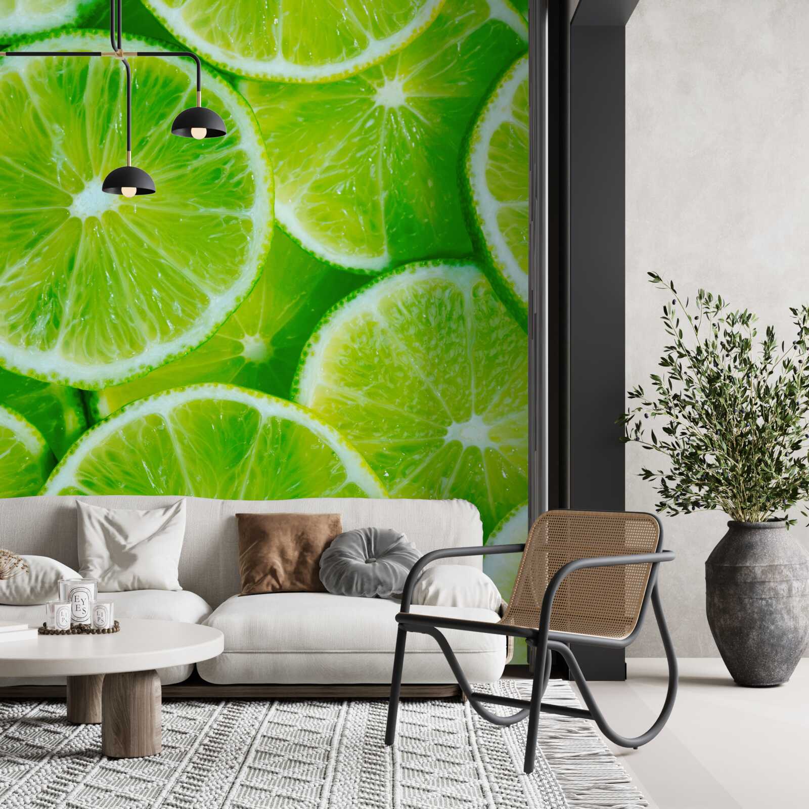 Papier peint couper le citron vert en fines tranches rondes