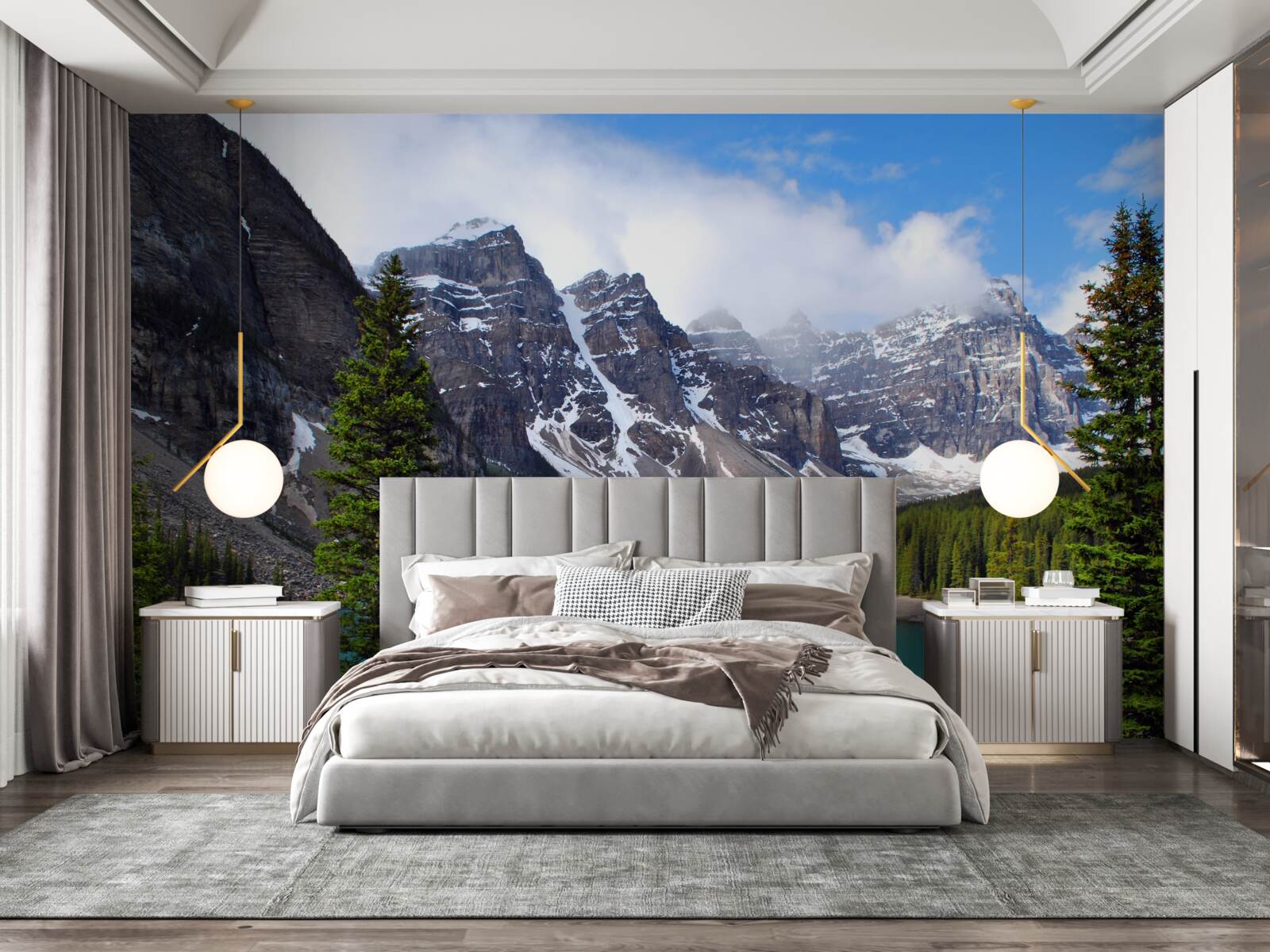 Papier peint un lac aux eaux bleues au pied de sommets montagneux