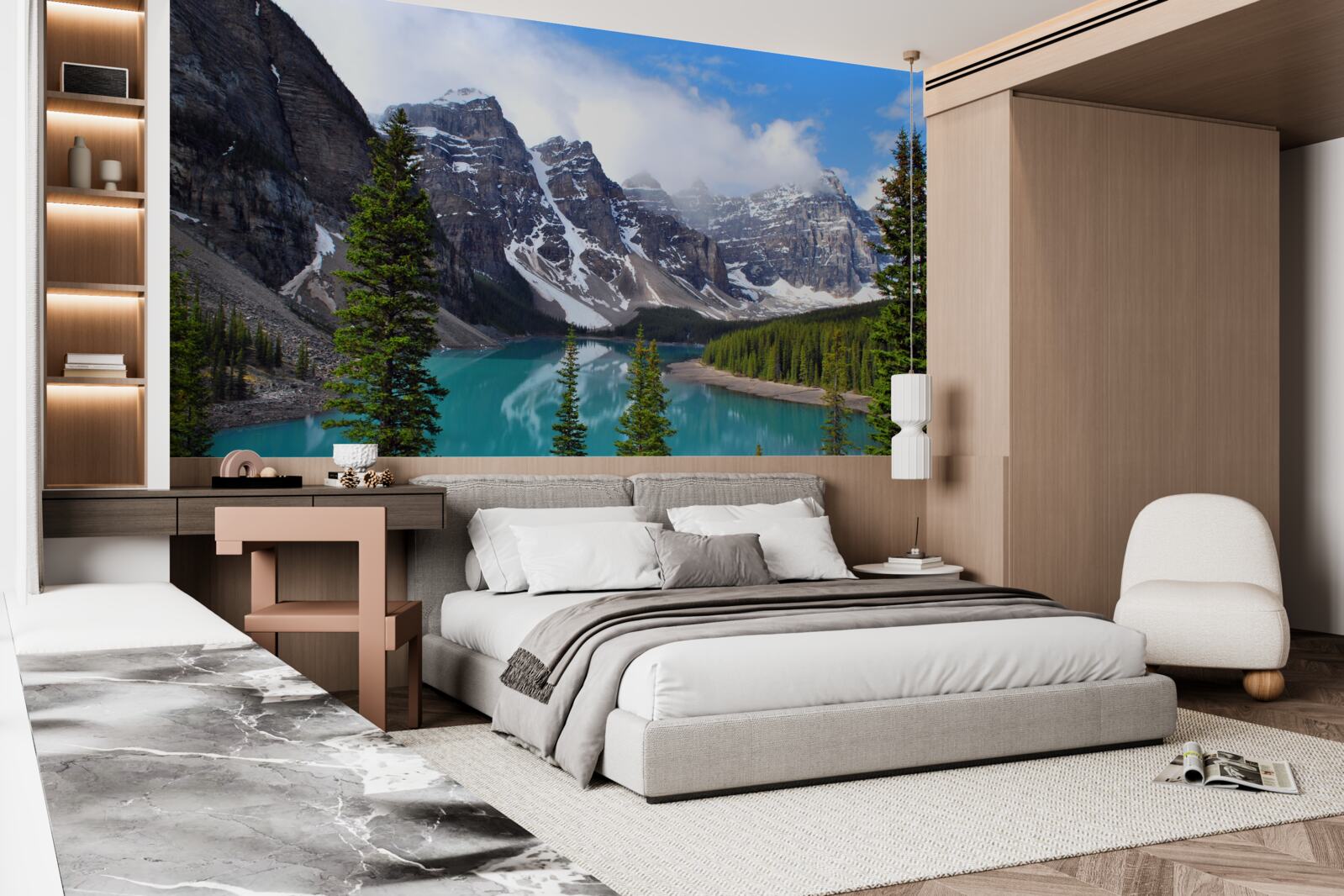 Papier peint un lac aux eaux bleues au pied de sommets montagneux