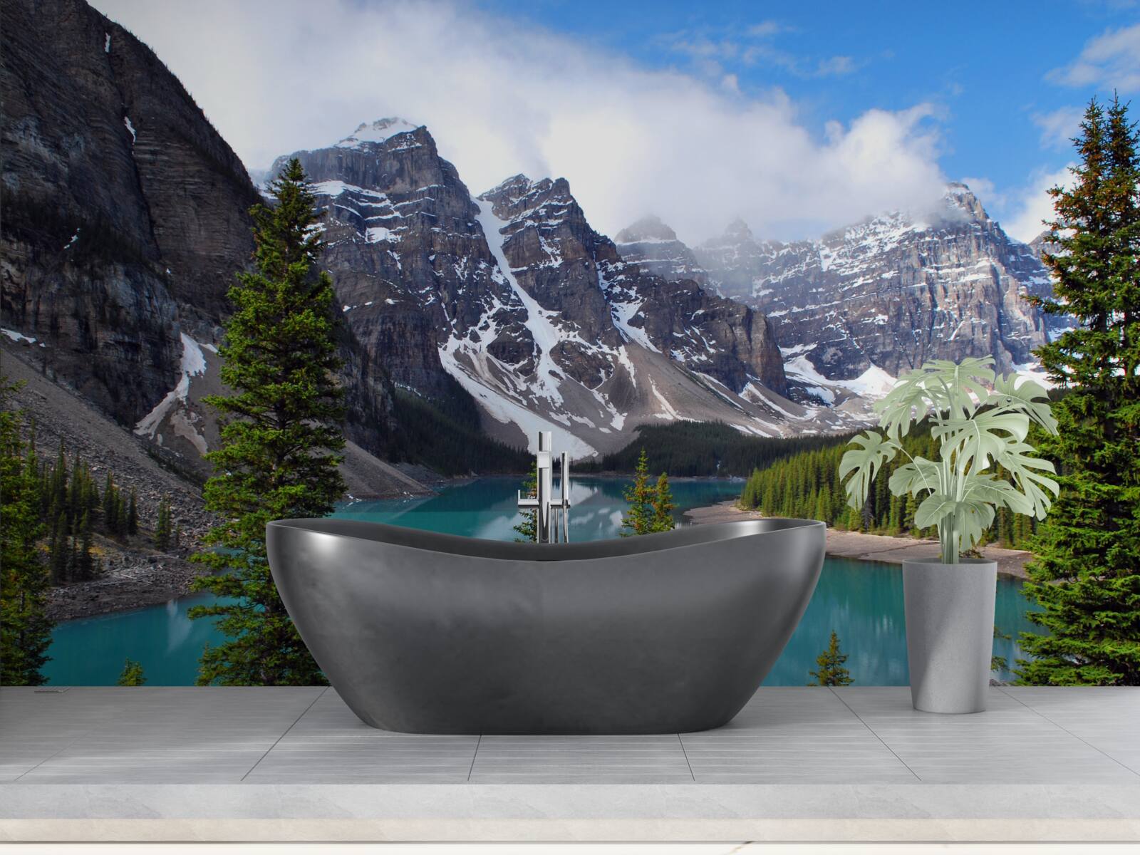 Papier peint un lac aux eaux bleues au pied de sommets montagneux