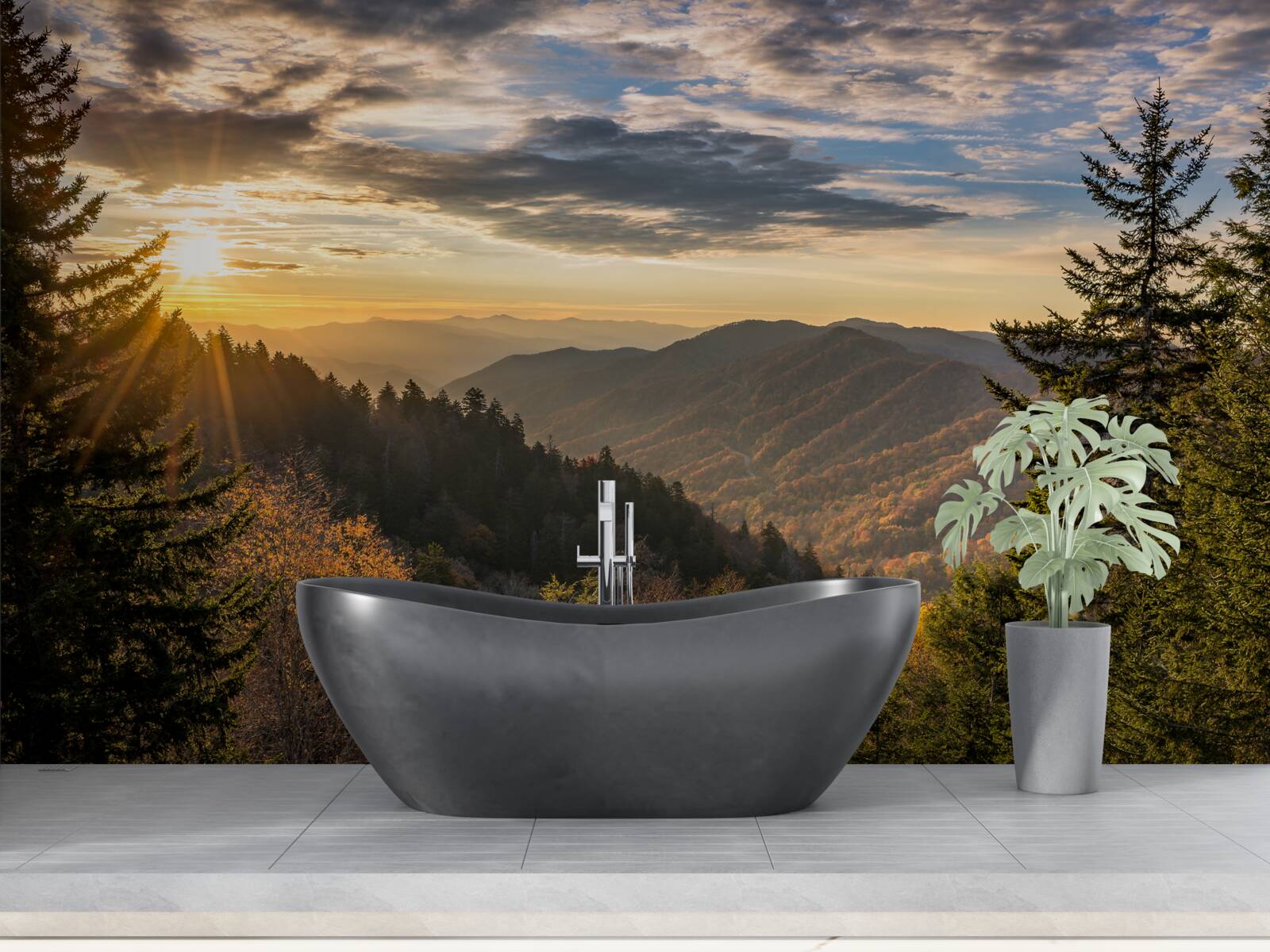 Papier peint le soleil couchant sur les sommets des montagnes