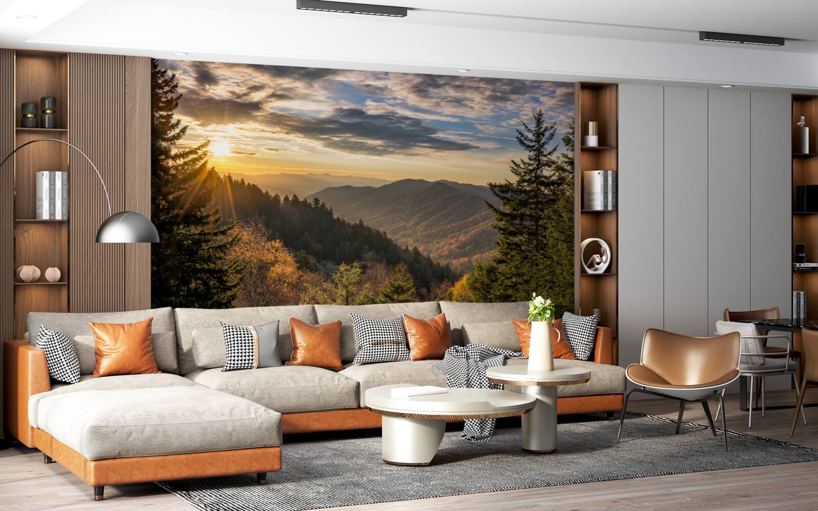 Papier peint le soleil couchant sur les sommets des montagnes