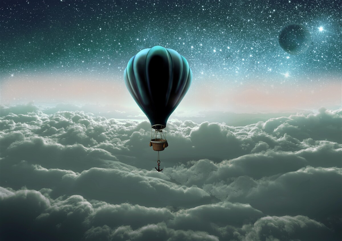Papier peint montgolfière nocturne flottant au-dessus des nuages