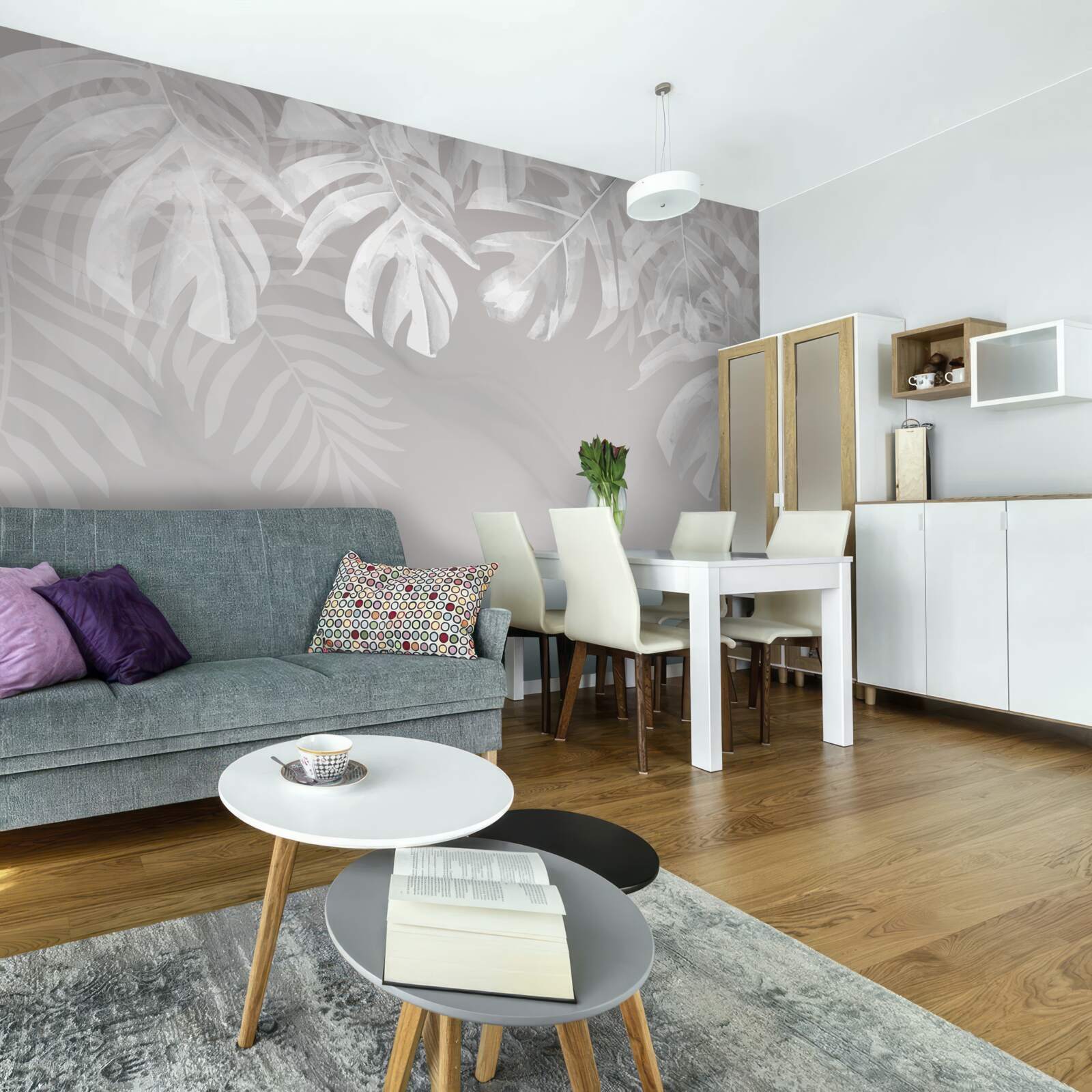 Papier peint monstera avec des feuilles pendantes blanches comme la neige