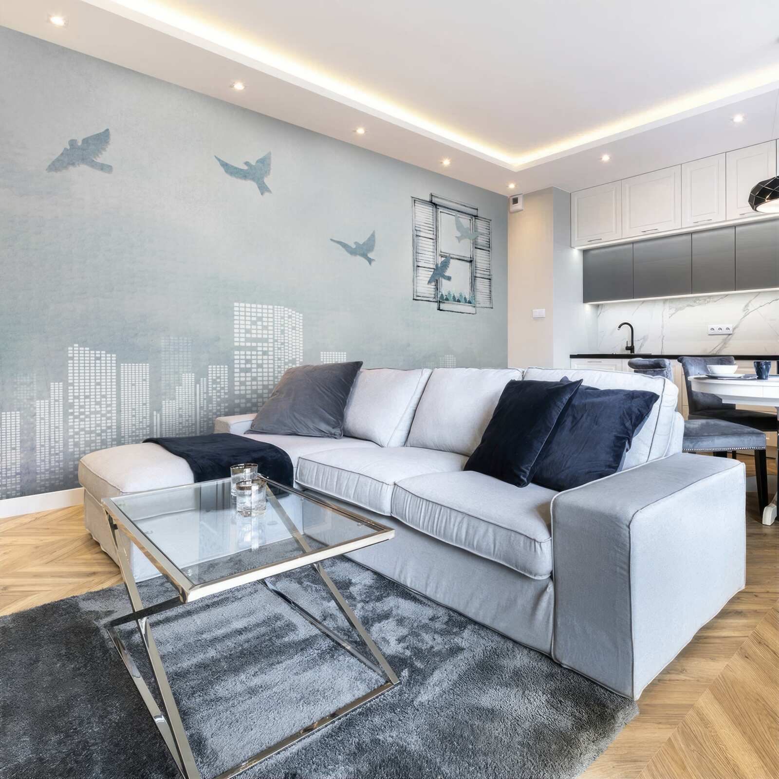 Papier peint oiseaux survolant une grande ville