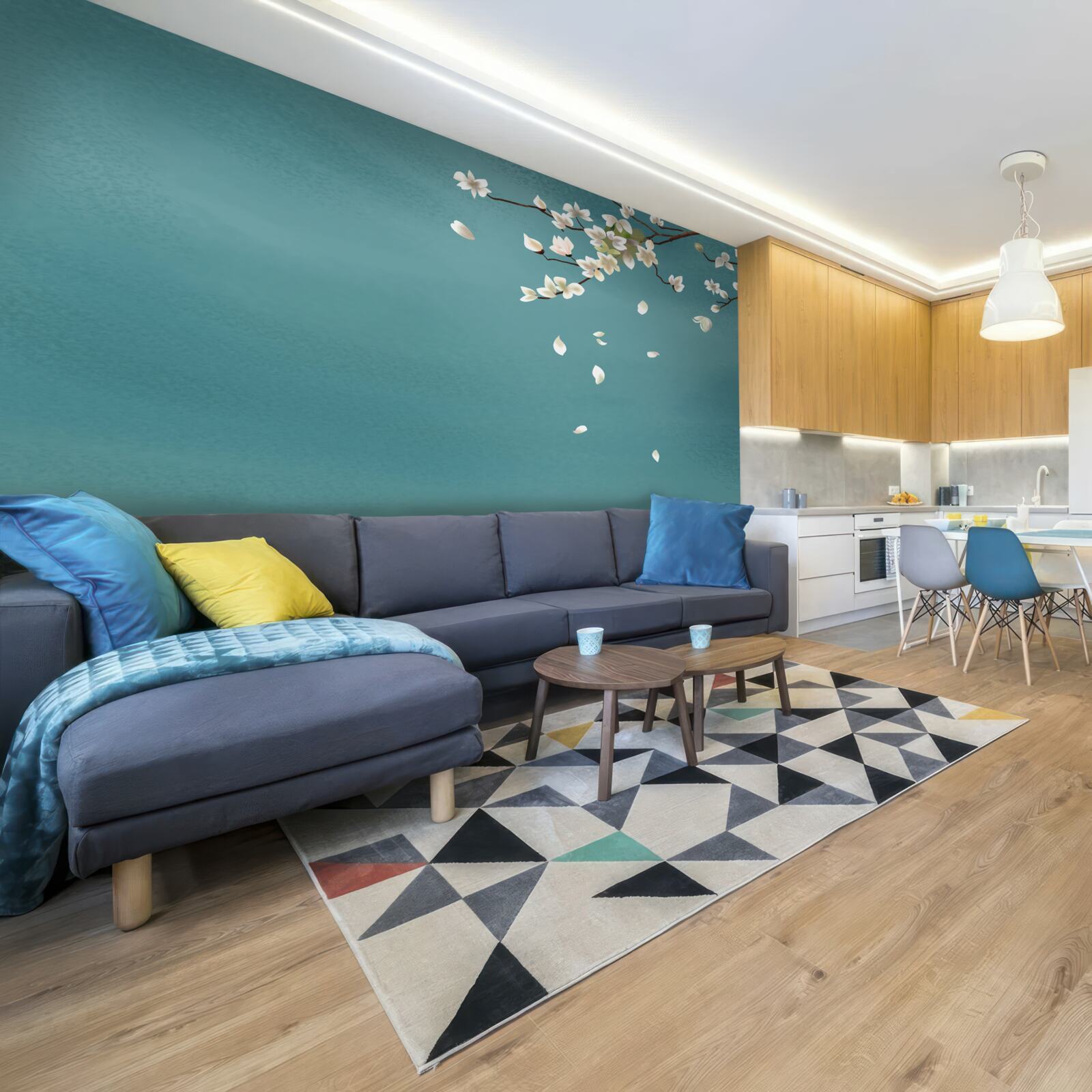 Papier peint fond turquoise décoré d'un arbre en fleurs