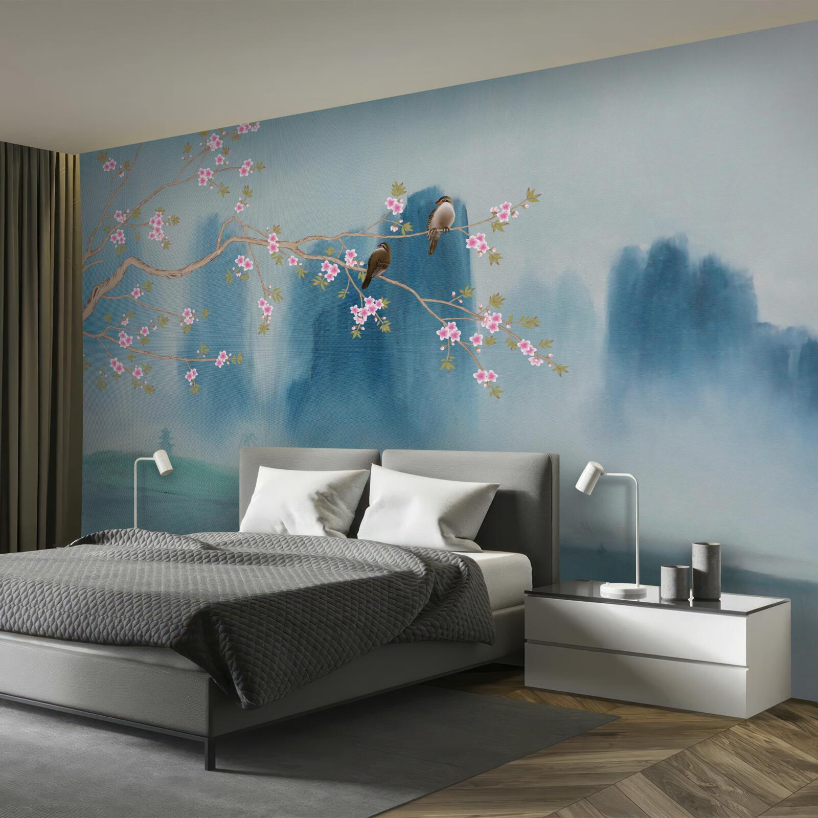 Papier peint les cerisiers en fleurs se ramifient au-dessus d'un lac couvert de brume