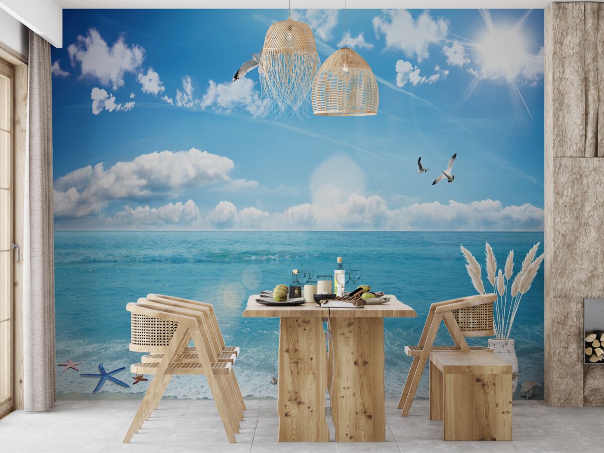 Papier peint mouettes sur les vagues bleues