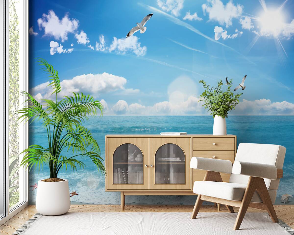 Papier peint mouettes sur les vagues bleues