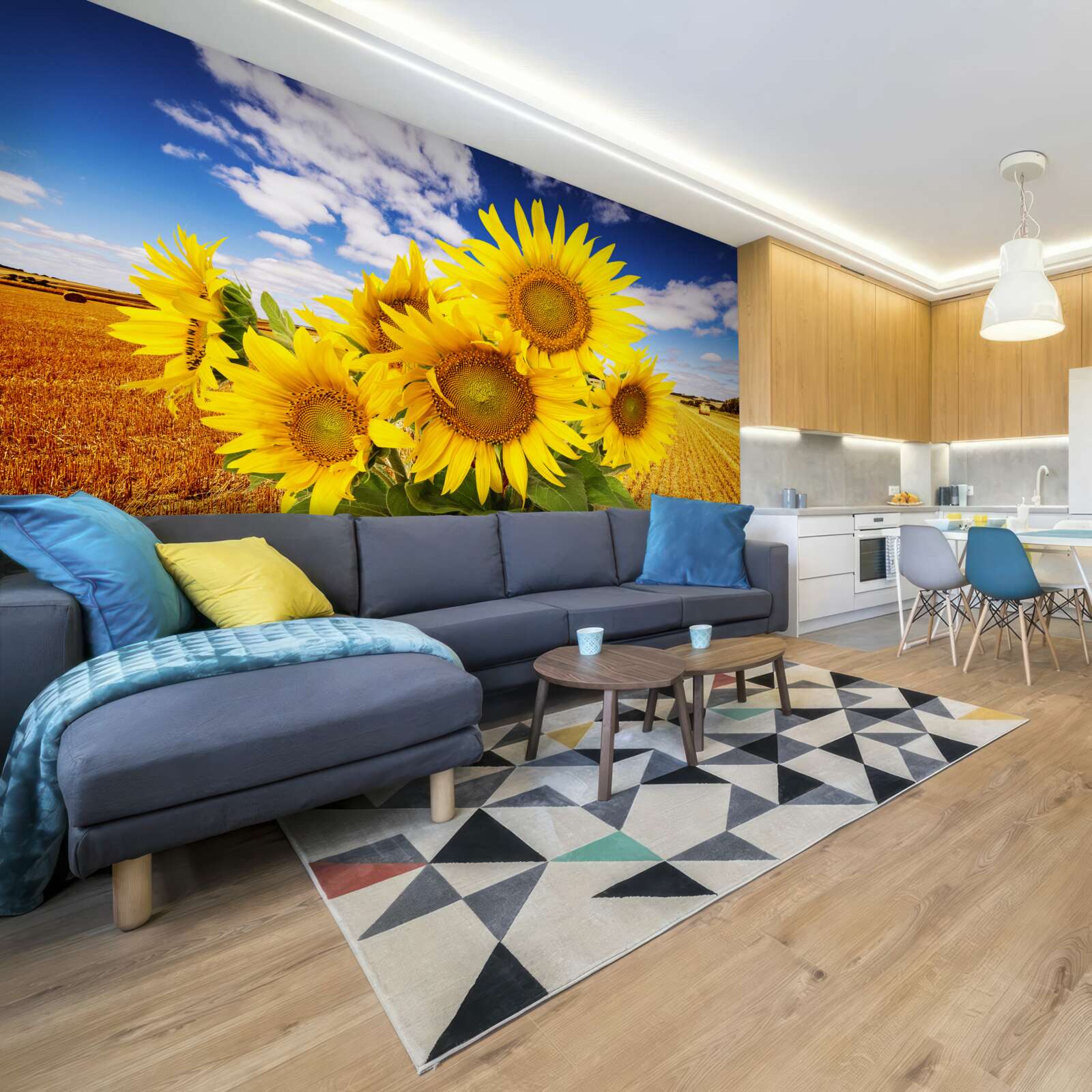 Papier peint un bouquet de tournesols se détache sur le ciel et un champ de blé