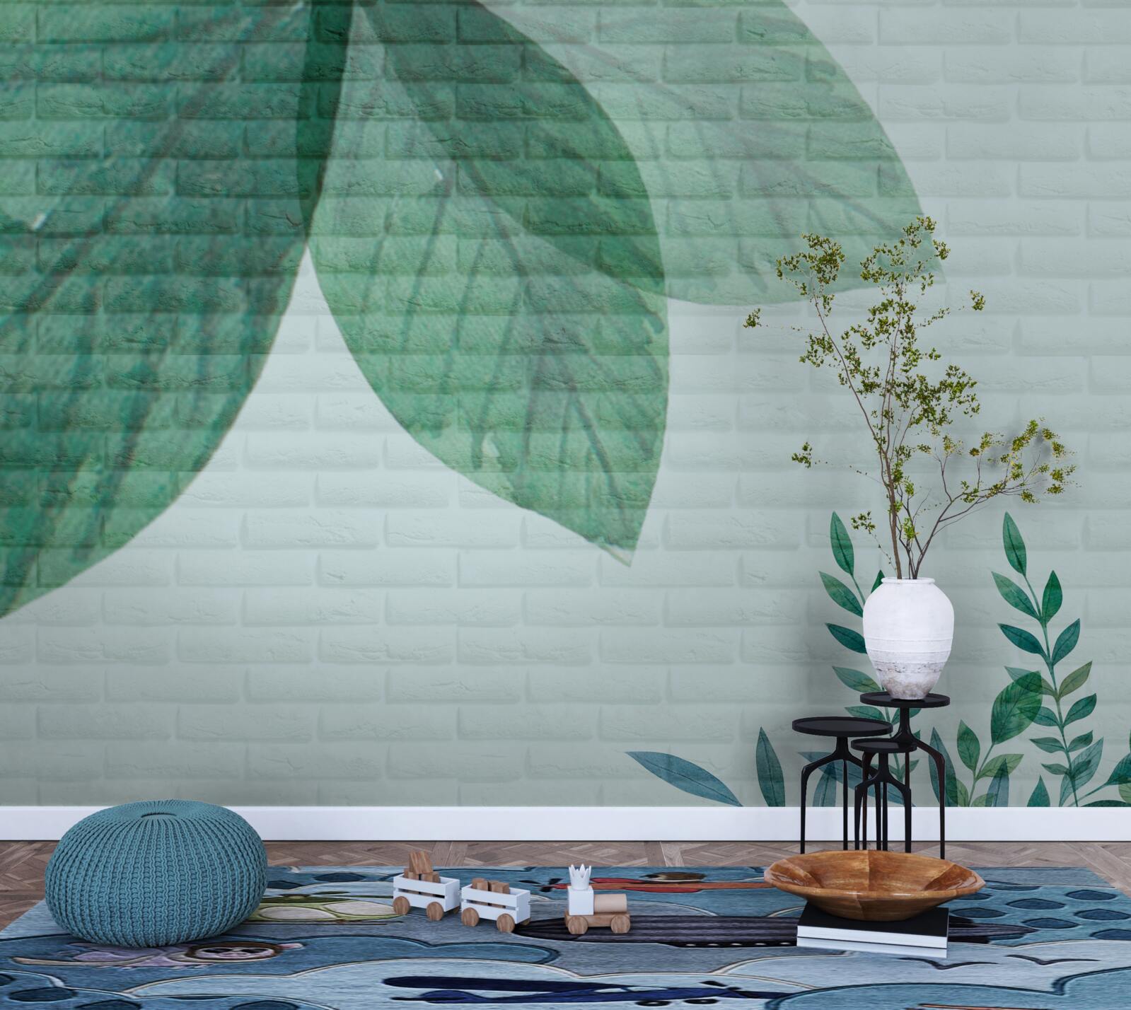 Papier peint aquarelle de feuilles vertes sur un mur de briques