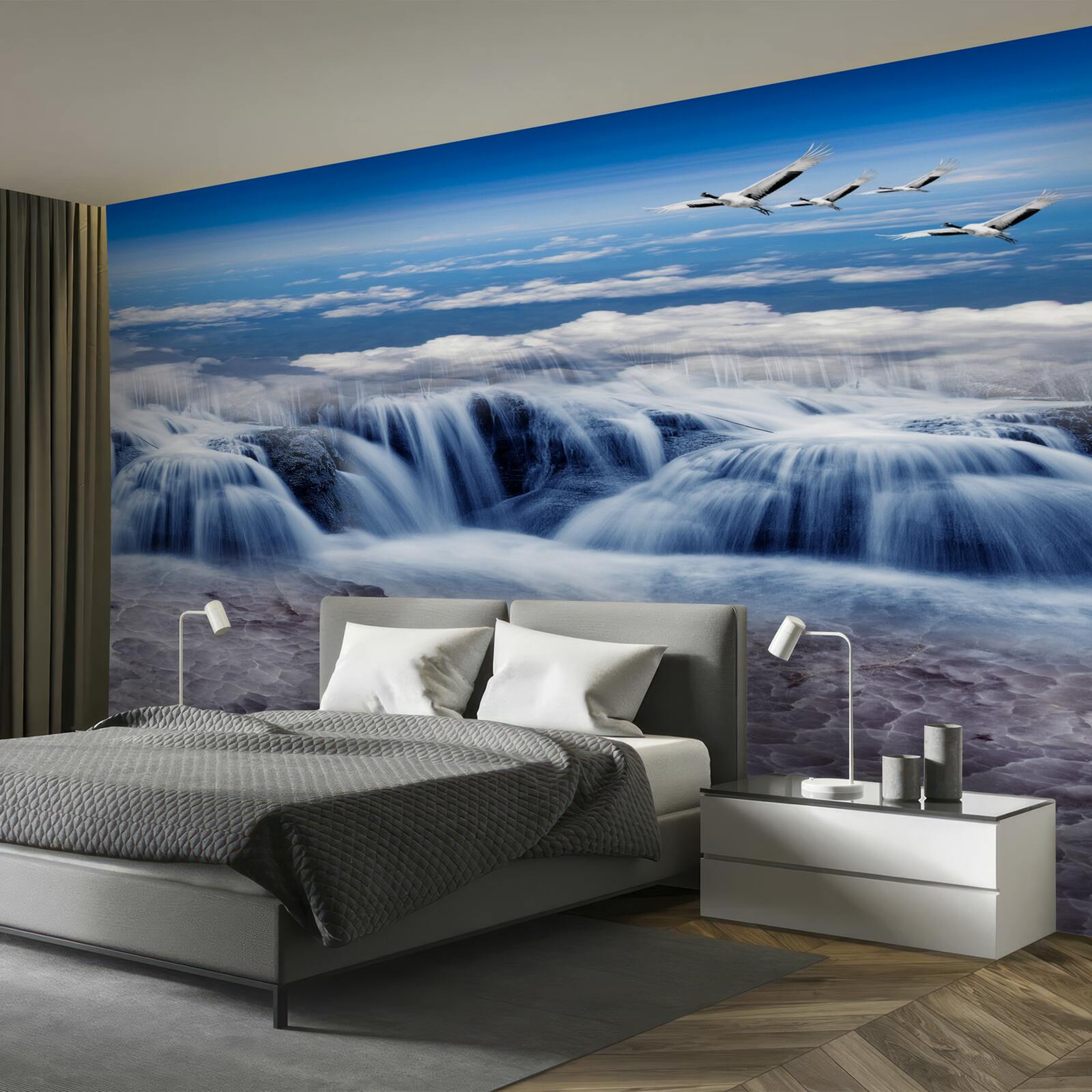 Papier peint une chute d'eau sur laquelle planent des oiseaux