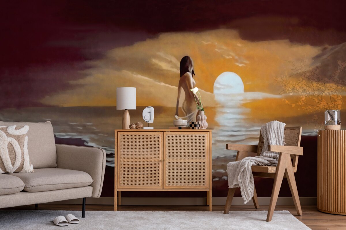 Papier peint une jeune fille regarde le coucher de soleil au bord de la mer