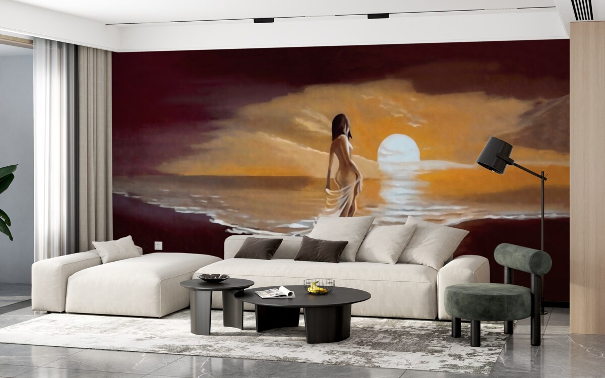 Papier peint une jeune fille regarde le coucher de soleil au bord de la mer