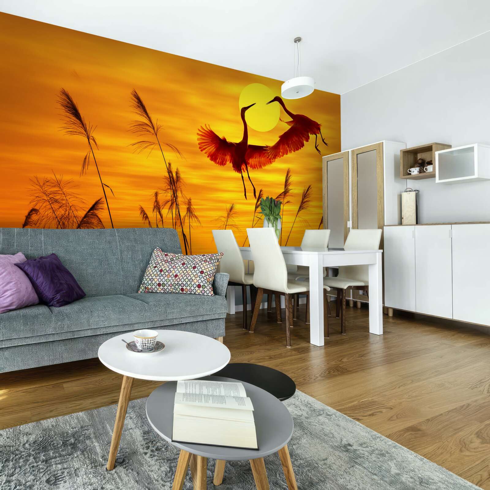 Papier peint le coucher de soleil est accompagné d'une volée de grues
