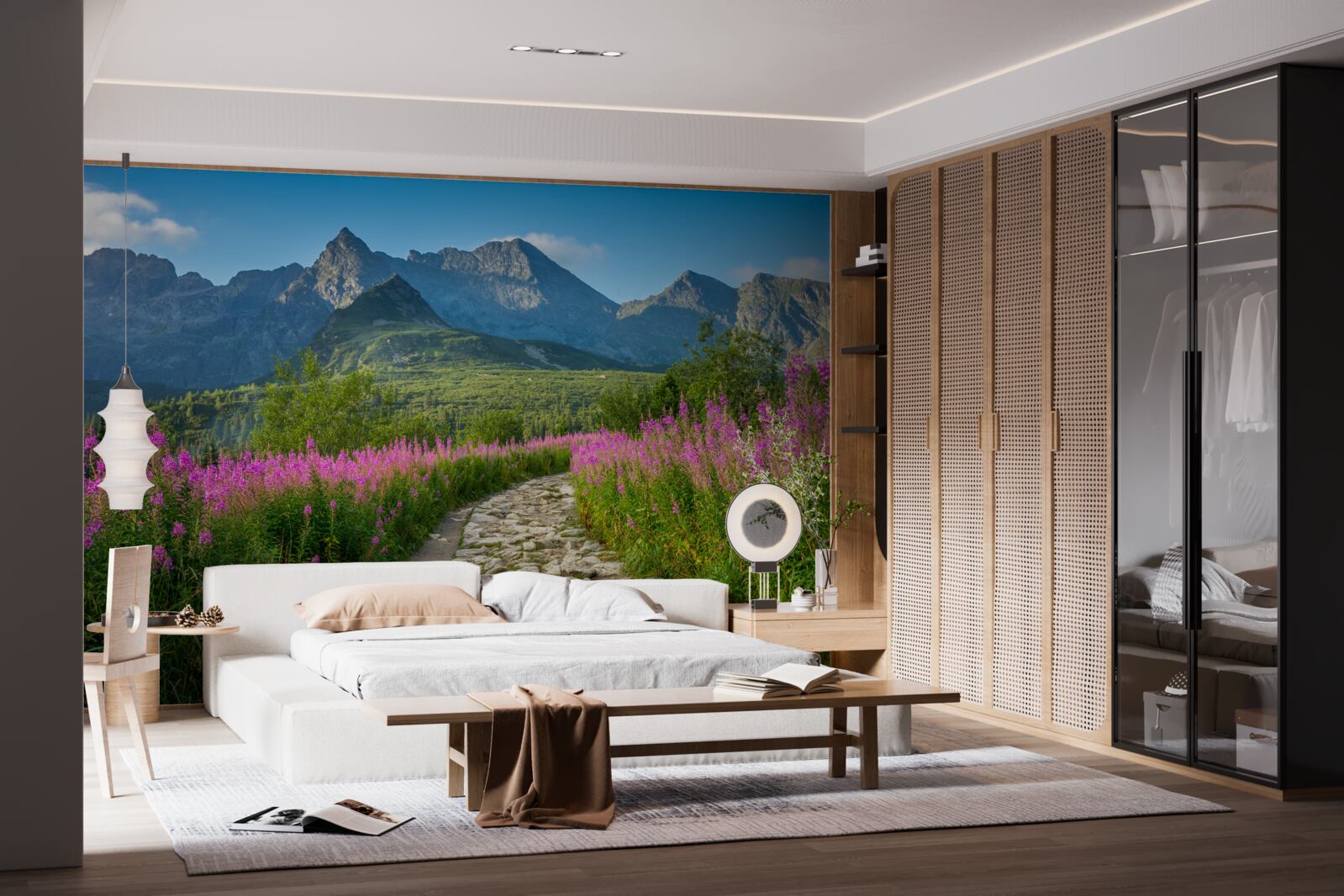 Papier peint Chemin au milieu d'un champ fleuri dans une région montagneuse