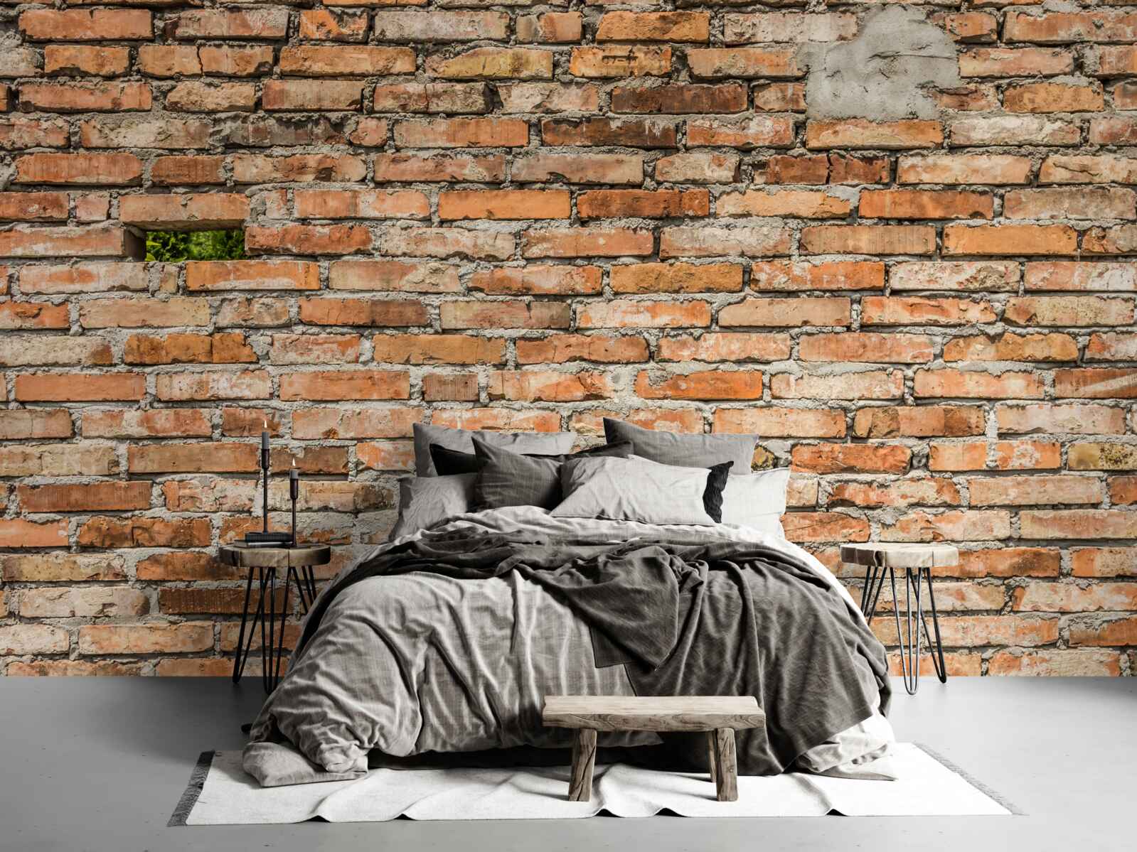 Papier peint Un mur dont les briques tombent et ont perdu leur fraîcheur