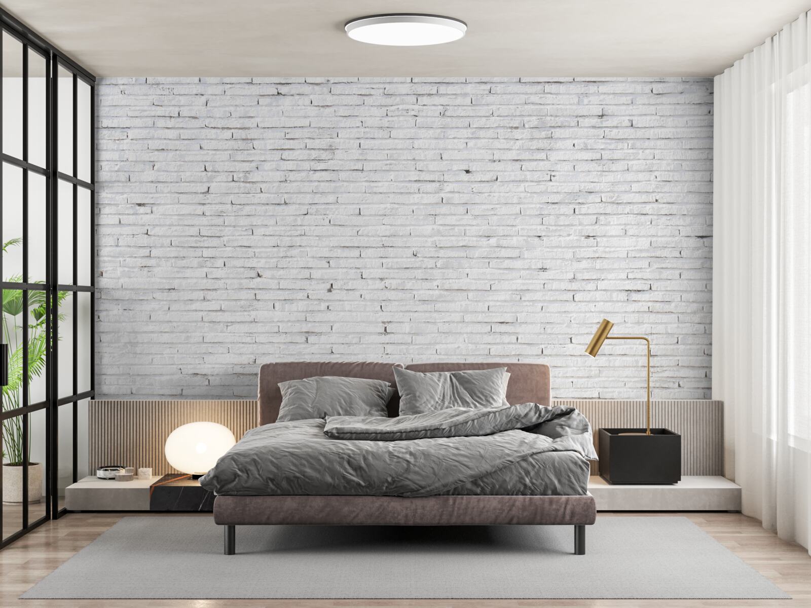 Papier peint Le mur est en brique, d'un blanc parfait