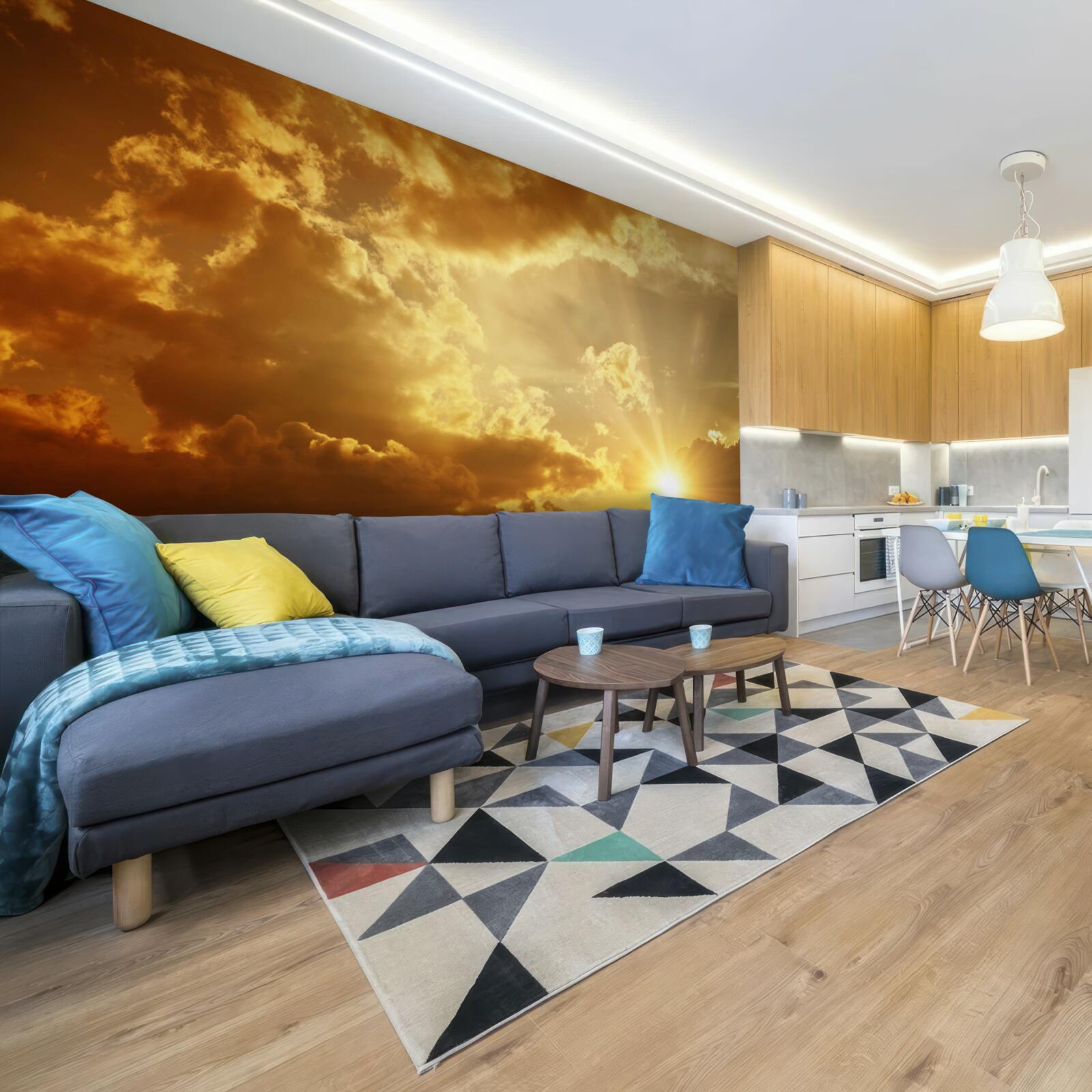 Papier peint les rayons du soleil qui percent les nuages au coucher du soleil dégagent de la chaleur