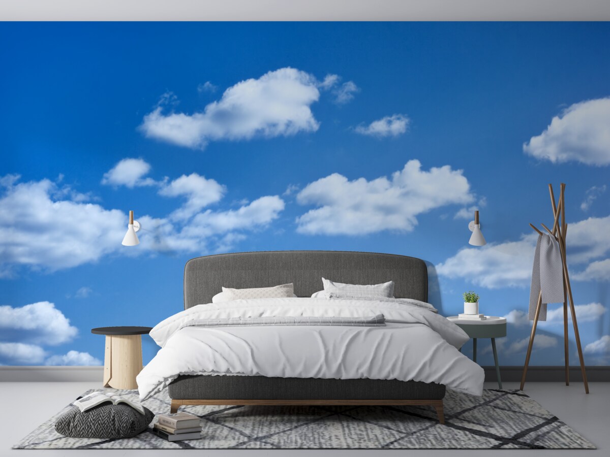 Papier peint nuages blancs flottant dans un ciel bleu