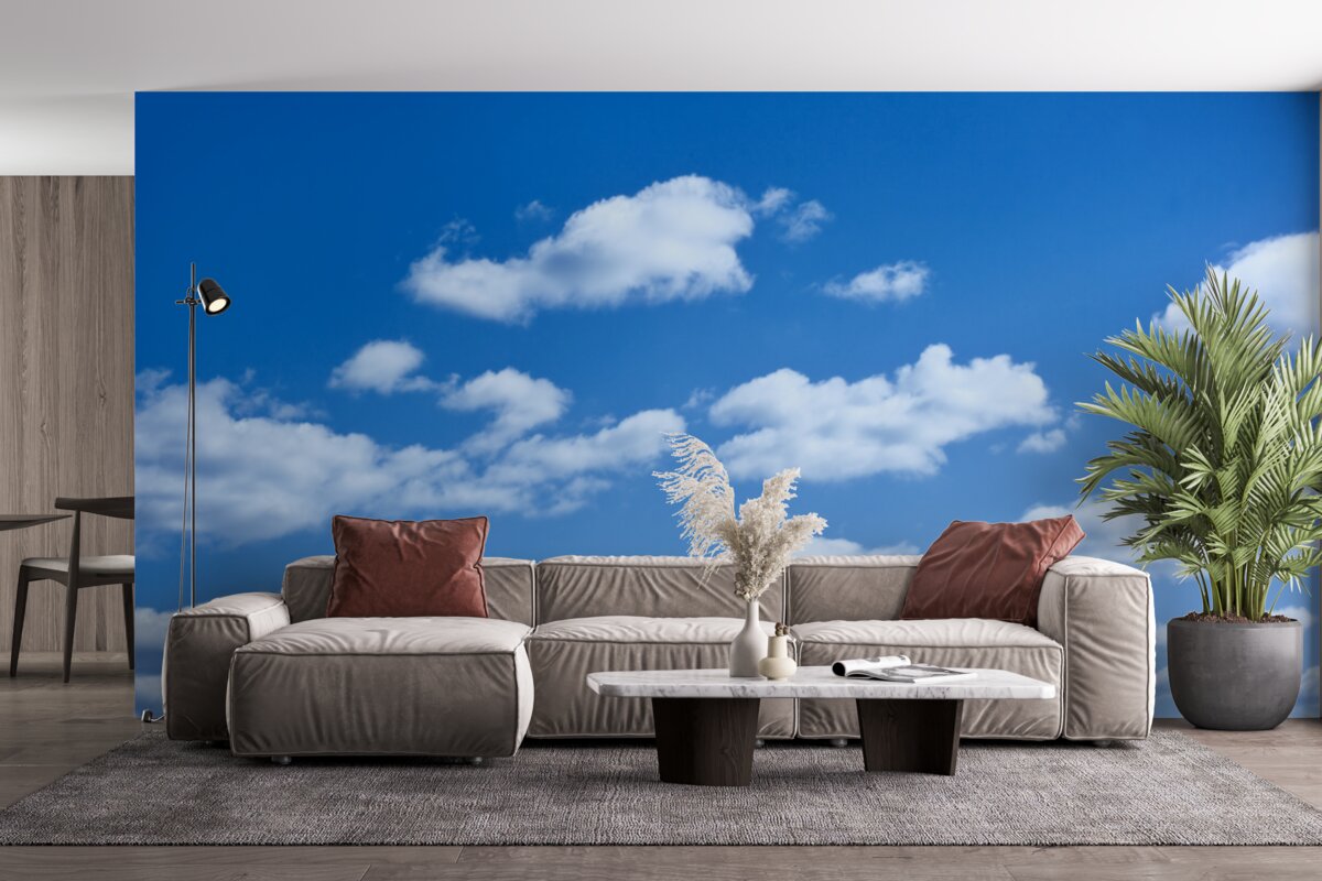 Papier peint nuages blancs flottant dans un ciel bleu