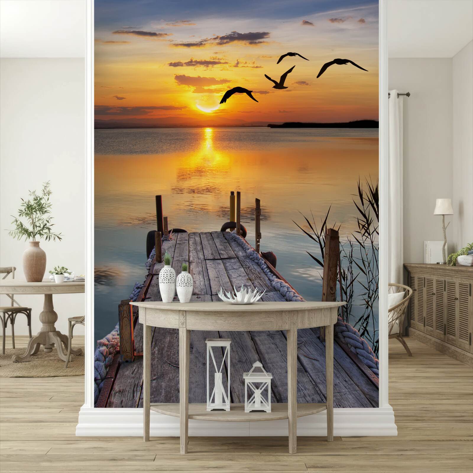 Papier peint un chaud coucher de soleil sur un pont où les mouettes tournent en rond