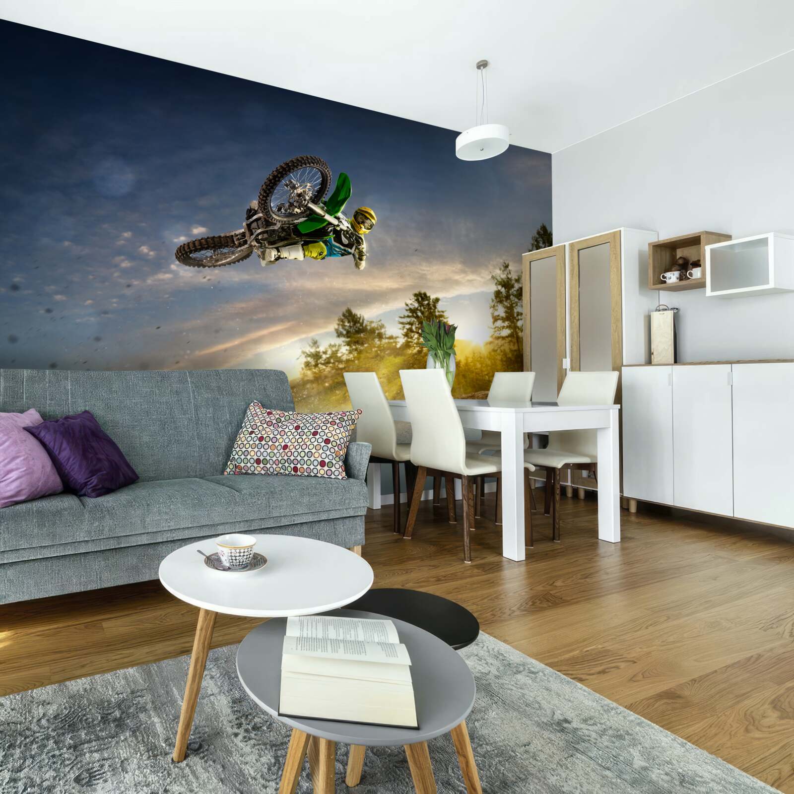 Papier peint sauter sur une moto au coucher du soleil