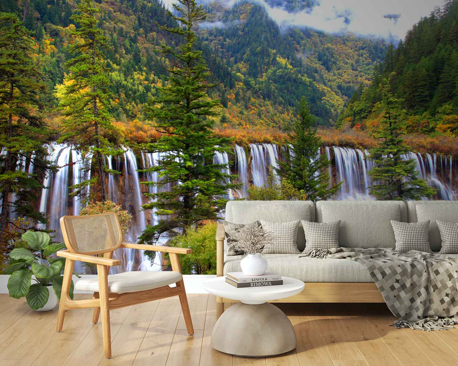 Papier peint une énorme chute d'eau qui coule à flanc de montagne