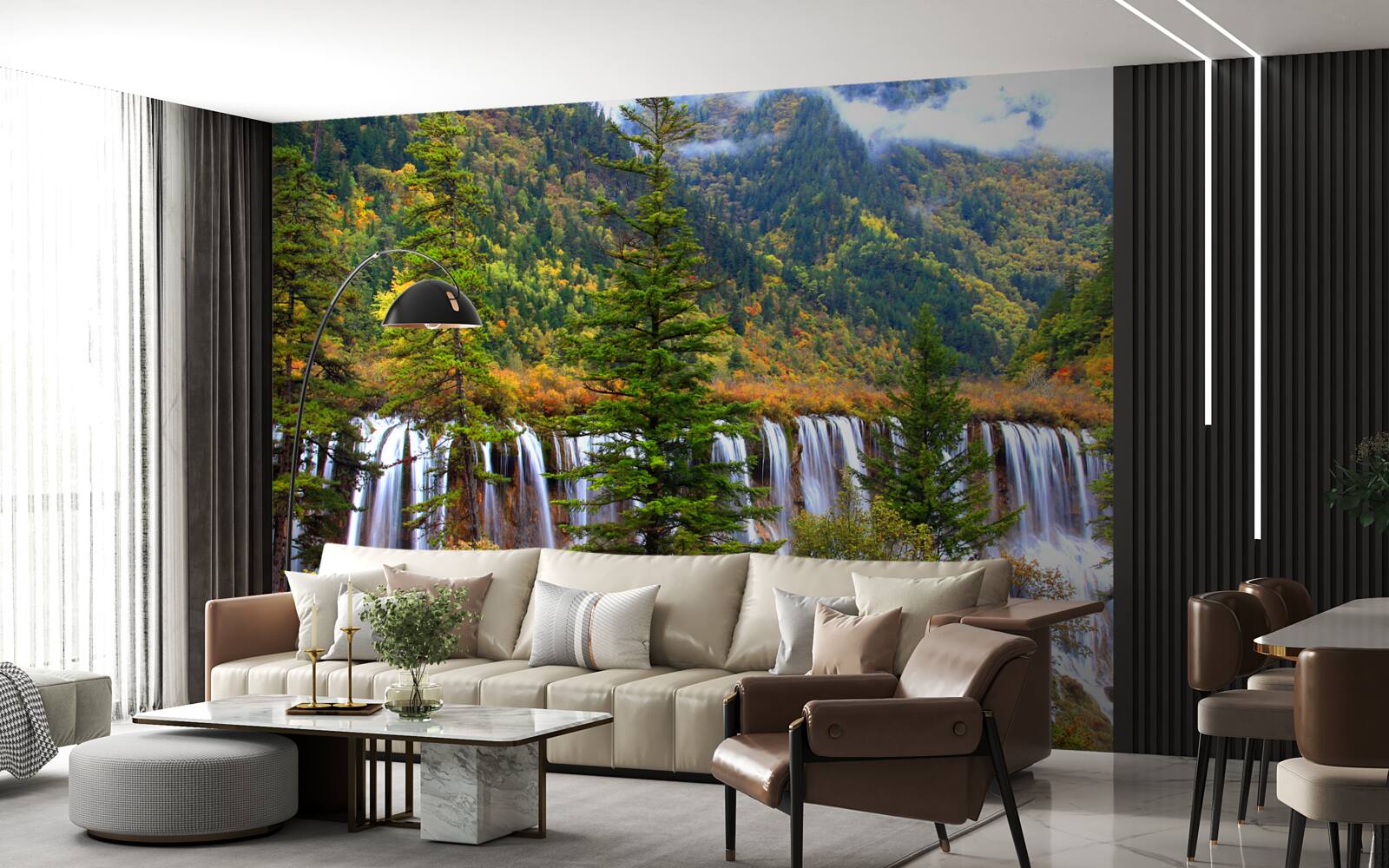 Papier peint une énorme chute d'eau qui coule à flanc de montagne