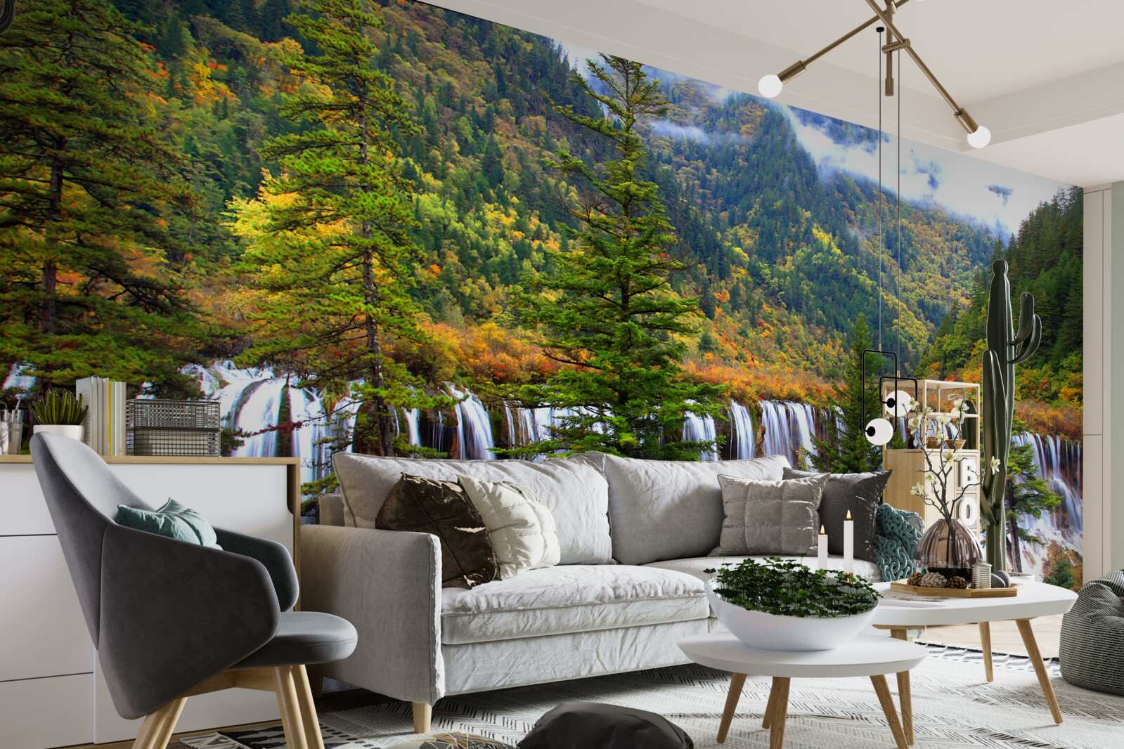 Papier peint une énorme chute d'eau qui coule à flanc de montagne