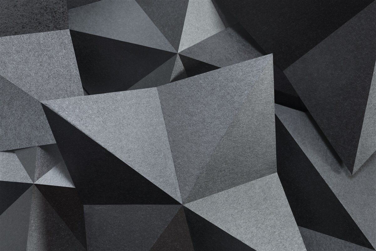 Papier peint figures géométriques sur fond sombre