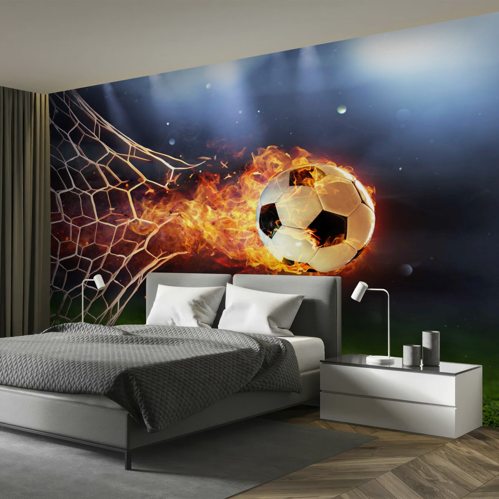 Papier peint La balle brûlante explose dans le filet de but